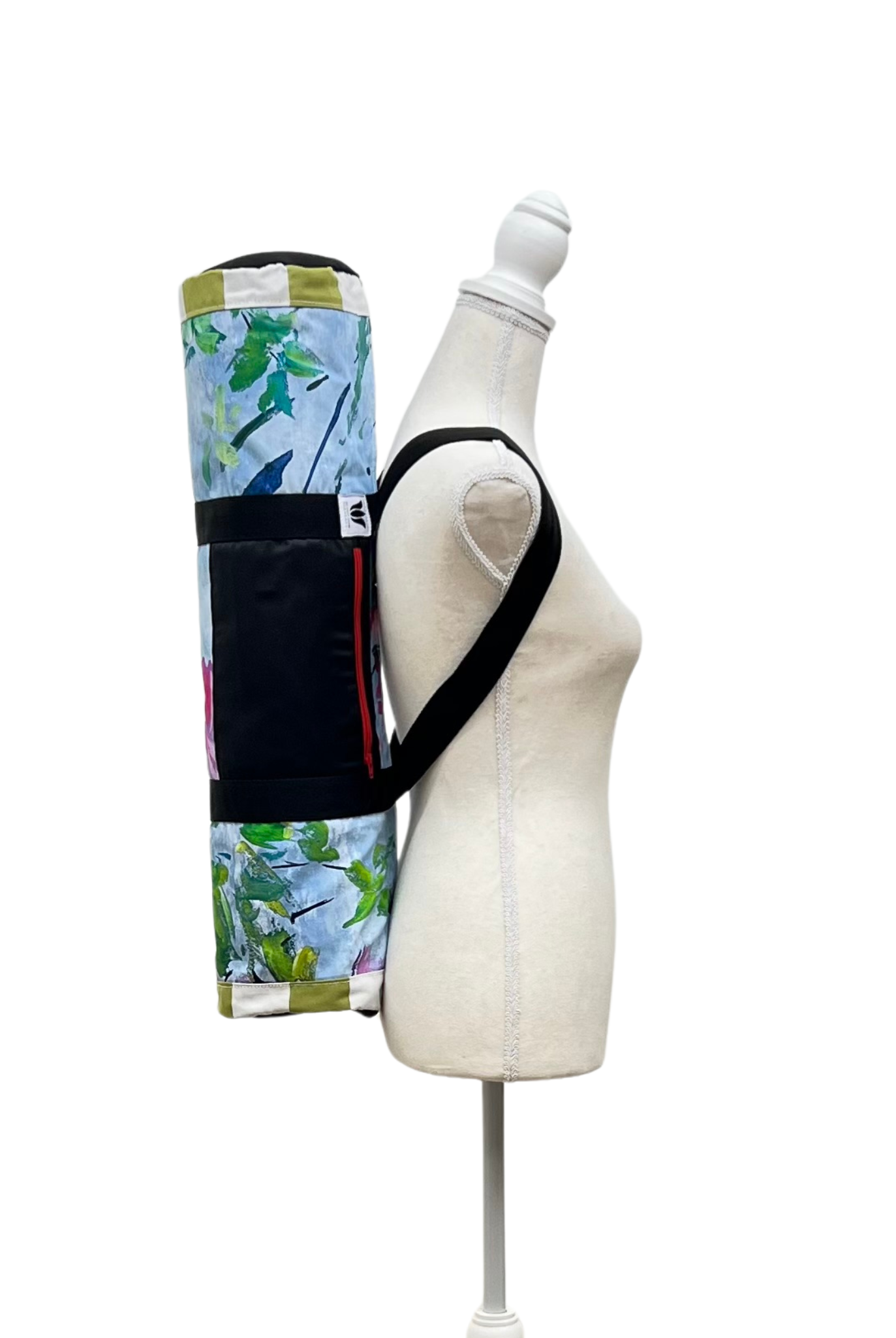 Blue yoga mat bag with black straps and pocket