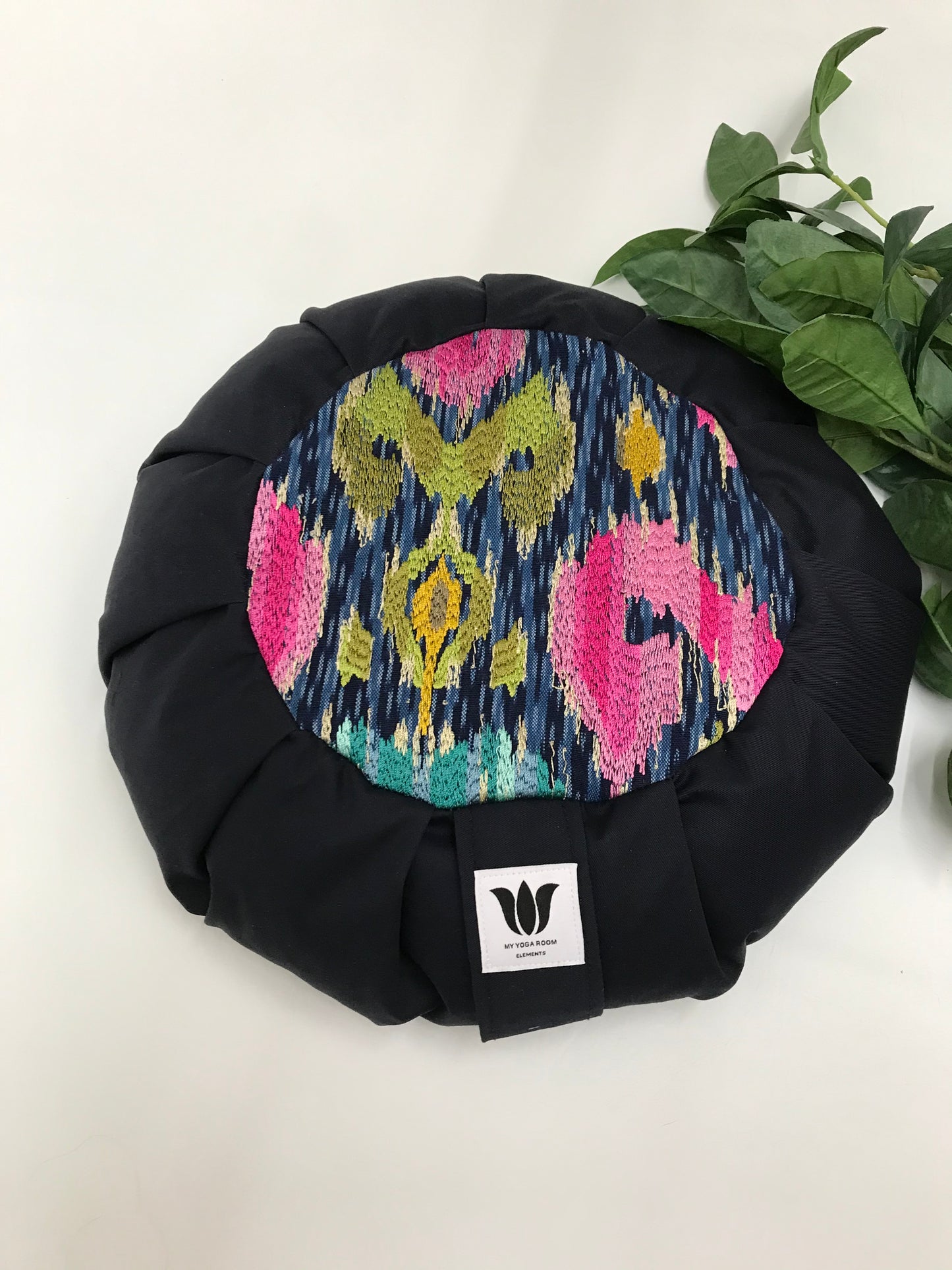 Handcrafted premium cotton canvas fabric meditation seat cushion in solid navy blue fabric with bright multi colour ikat print center. Align the spine and body in comfort to calm the monkey mind in your meditation practice. Handcrafted in Calgary, Alberta Canada