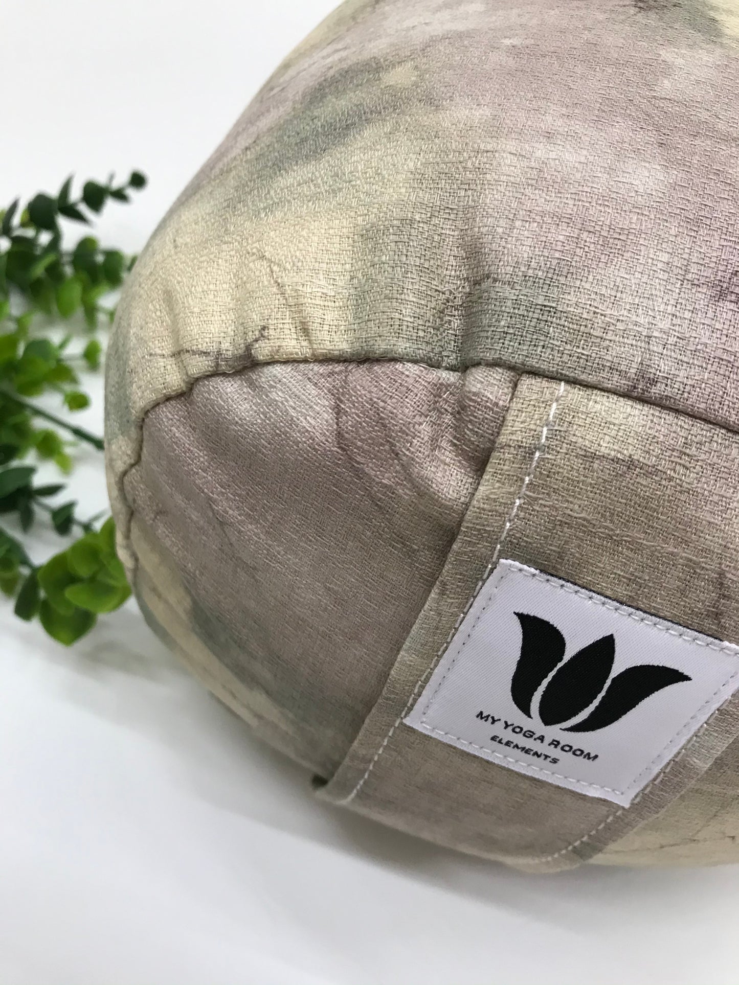 Round yoga bolster in durable poly cotton, in subtle purple marble print fabric. Allergy conscious fill with removeable cover. Made in Canada by My Yoga Room Elements