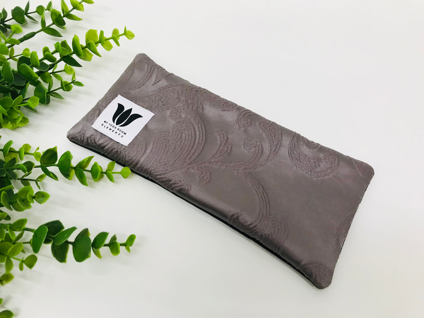 Yoga eye pillow, unscented, therapeutically weighted to soothe eye strain and stress or enhance your savasana. Handcrafted in Canada by My Yoga Room Elements. Purple embossed satin print and bamboo fabric.