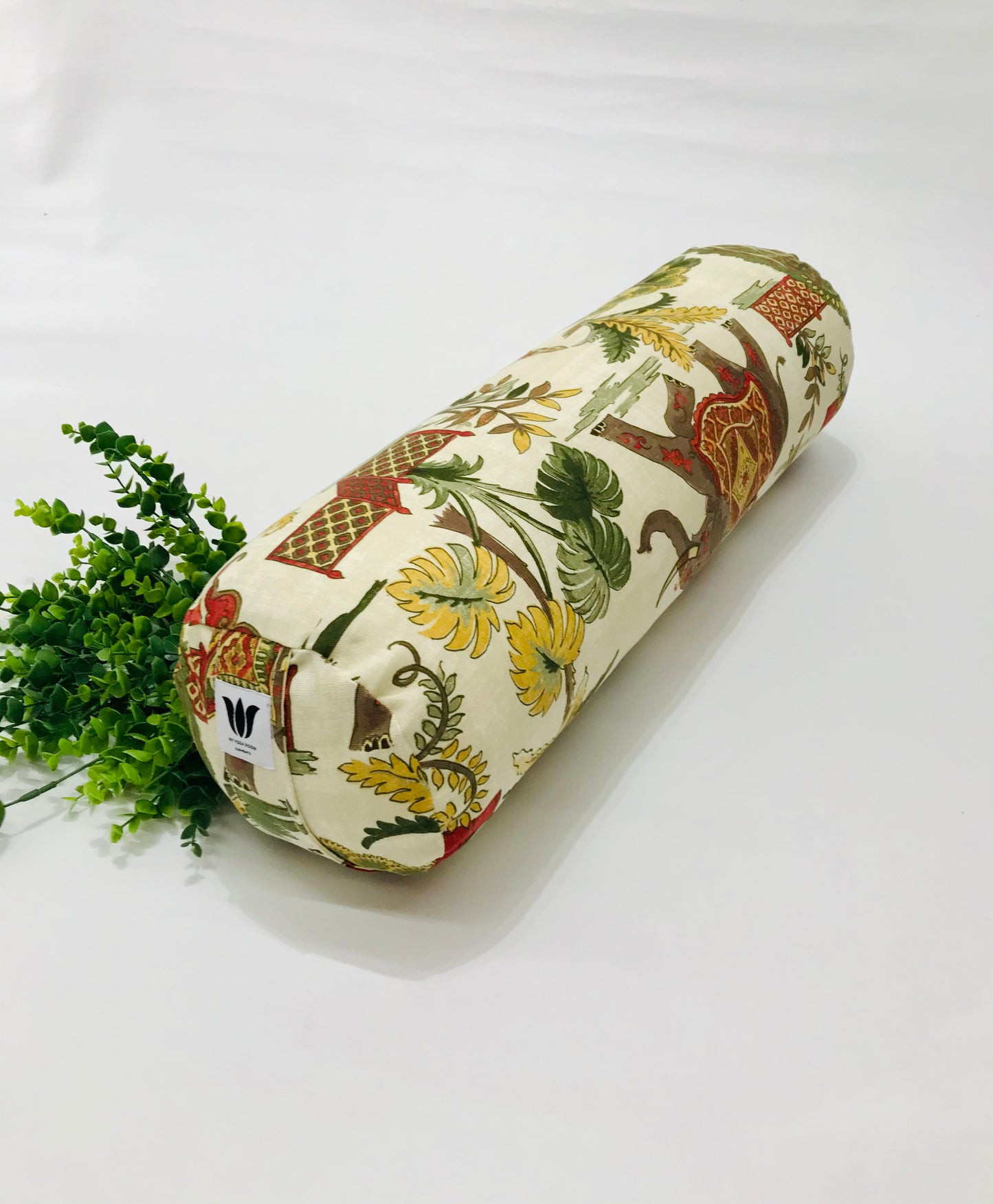 Round yoga bolster in cotton canvas, novelty fabric with India images fabric. Allergy conscious fill with removeable cover. Made in Canada by My Yoga Room Elements