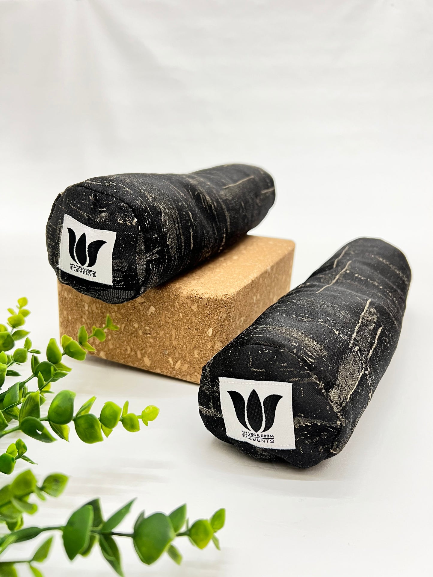 Mini yoga bolster in durable fabric, black and beige hatch print fabric. Cushion and support the body in the practice of yoga and meditation.Removeable cover. Made in Canada by My Yoga Room Elements