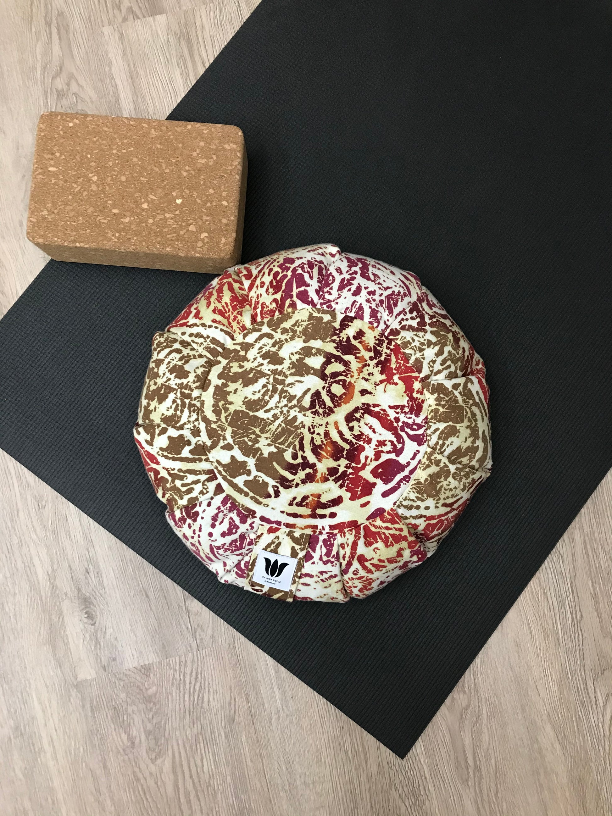 Handcrafted premium cotton canvas fabric meditation seat cushion in graphic print pink gold beige purple fabric. Align the spine and body in comfort to calm the monkey mind in your meditation practice. Handcrafted in Calgary, Alberta Canada