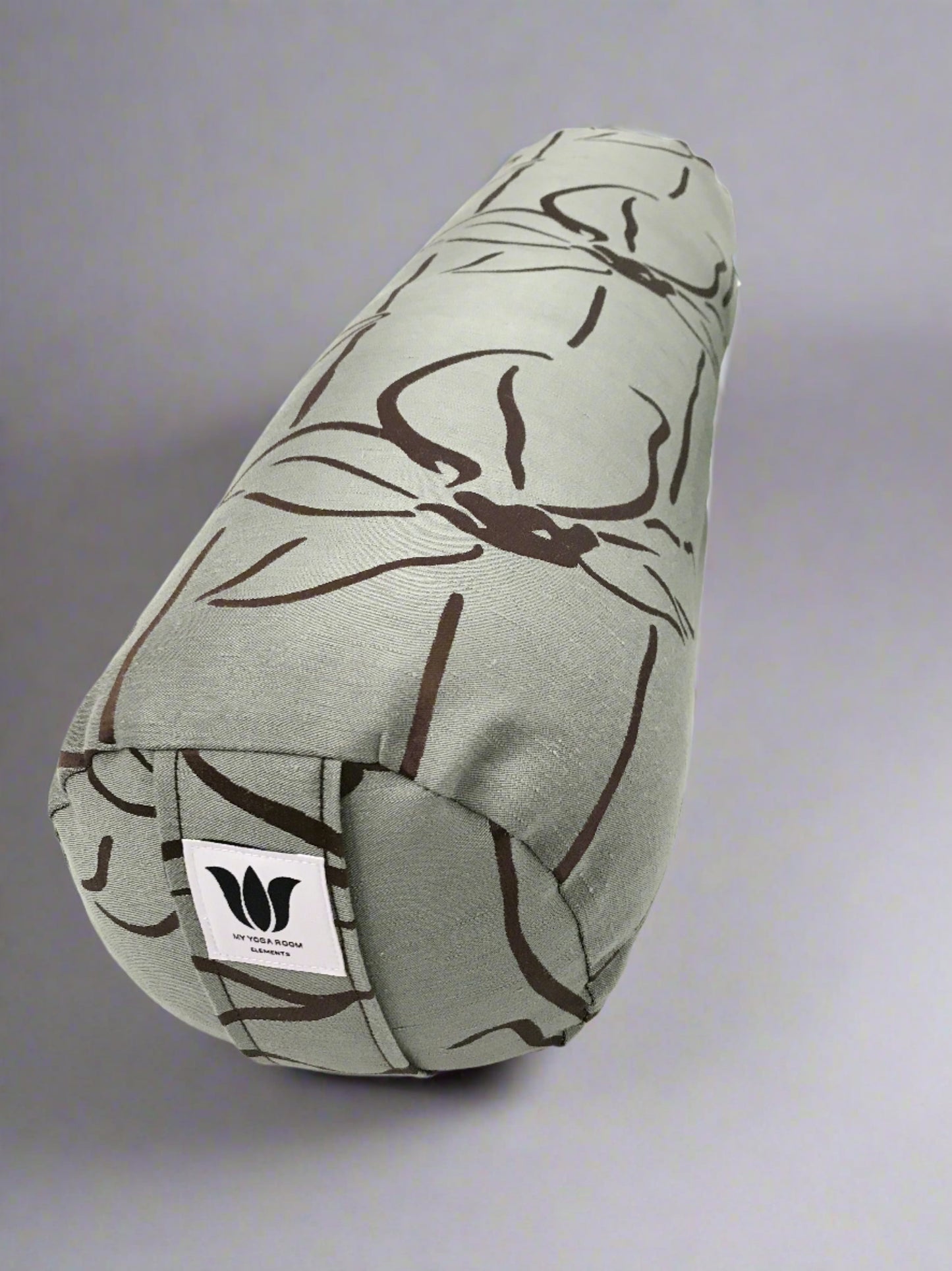 Round yoga bolster in textured linen fabric, line floral graphic in sage and brown fabric. Allergy conscious fill with removeable cover. Made in Canada by My Yoga Room Elements