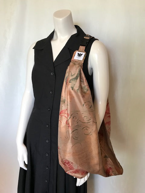 Turn your infinity scarf into a support for your meditation practice, quick snap and adjust to align the spine and sit in comfort. Created by My Yoga Room Elements and produced in Canada . Champagne Floral Silk