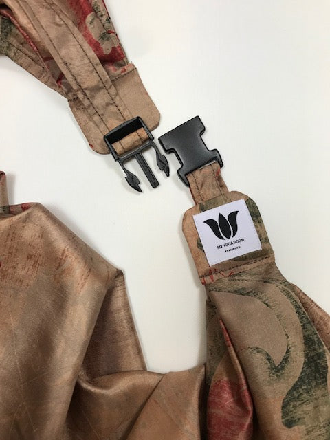 Turn your infinity scarf into a support for your meditation practice, quick snap and adjust to align the spine and sit in comfort. Created by My Yoga Room Elements and produced in Canada . Champagne Floral Silk