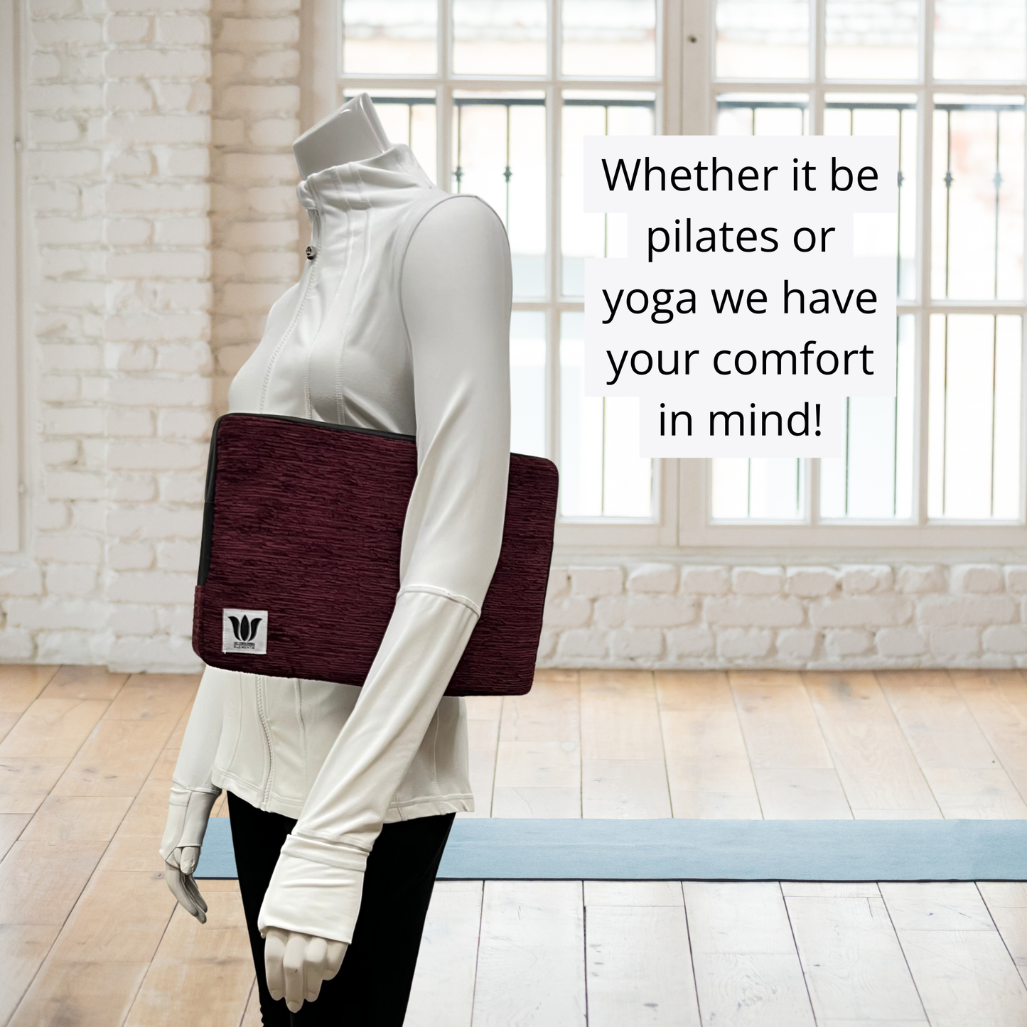Person holding a purple yoga block with text about Pilates and yoga comfort.