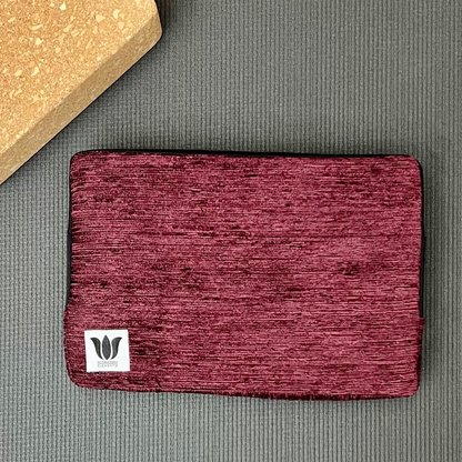 purple fabric covered block for yoga, pilates or exercise