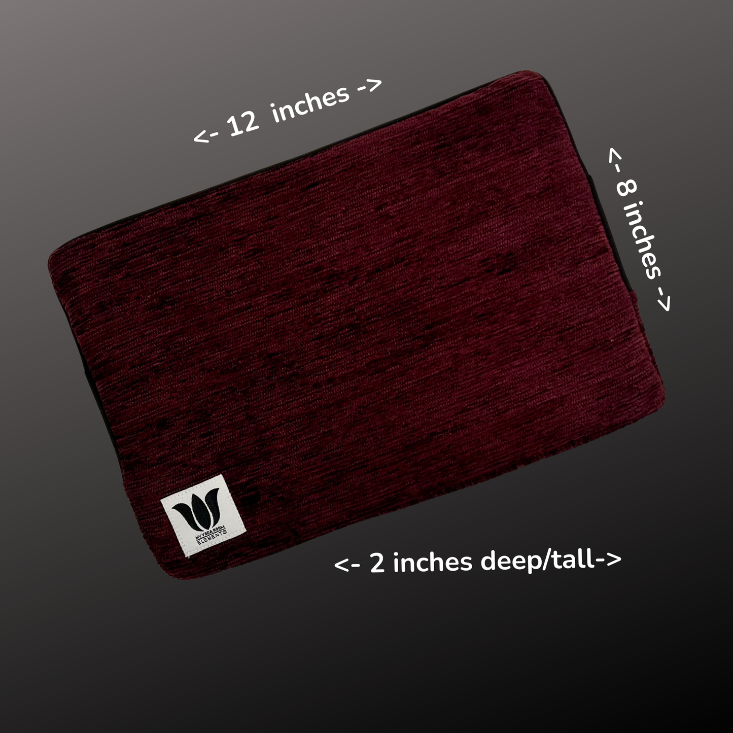 Dark purple block with dimensions indicated on a gray background