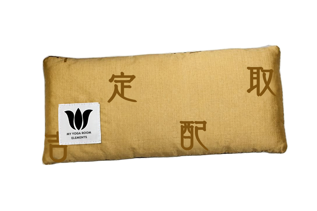 A rectangular gold fabric eyepillow with gold Chinese characters printed on it and a white brand label on the left side, shown against a plain white background.