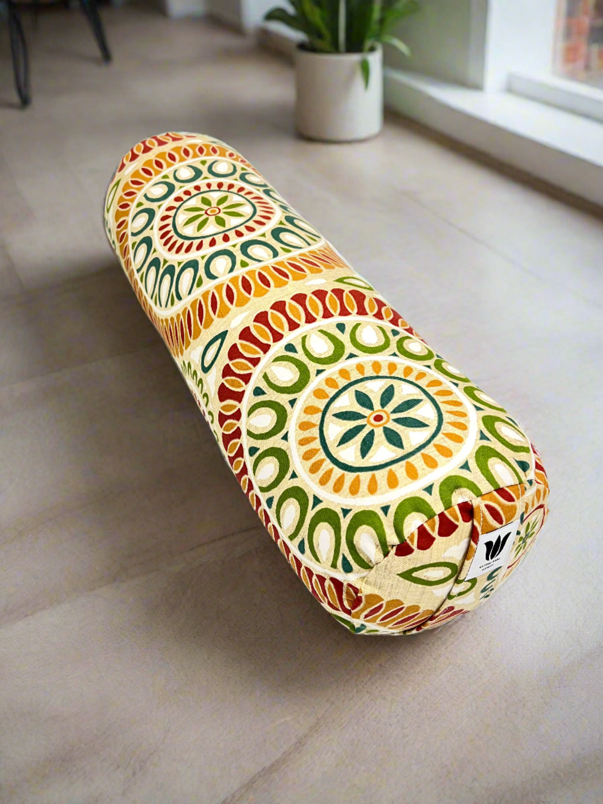 round yoga bolster in citrus color mandala print cotton fabric. made in calgary alberta canada