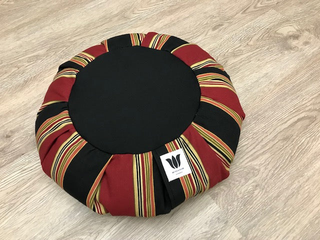 Handcrafted premium cotton canvas meditation seat cushion in red, black , gold varying width stripe. Align the spine and body in comfort to calm the monkey mind in your meditation practice. Handcrafted in Calgary, Alberta Canada