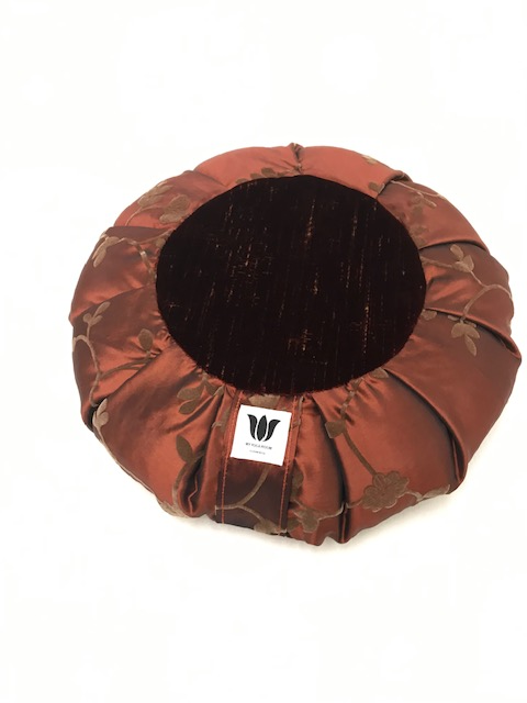 Handcrafted premium embossed plush and satin fabric meditation seat cushion in shades of rich bronze coloured fabric. Align the spine and body in comfort to calm the monkey mind in your meditation practice. Handcrafted in Calgary, Alberta Canada