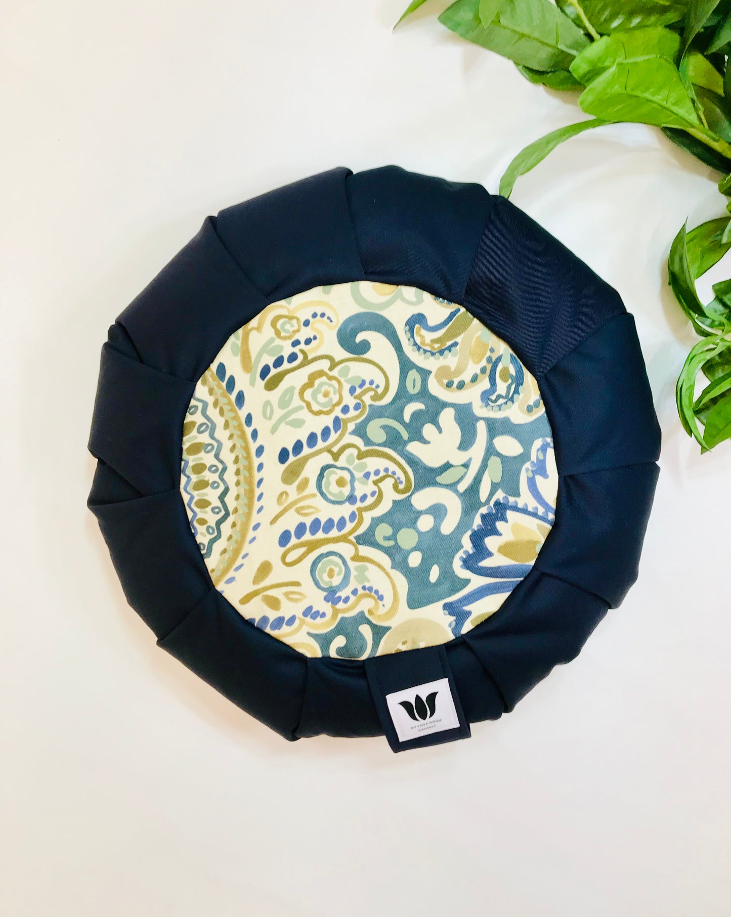 Handcrafted premium cotton canvas fabric meditation seat cushion in shades navy blue and blue, green, yellow modern graphic printfabric. Align the spine and body in comfort to calm the monkey mind in your meditation practice. Handcrafted in Calgary, Alberta Canada