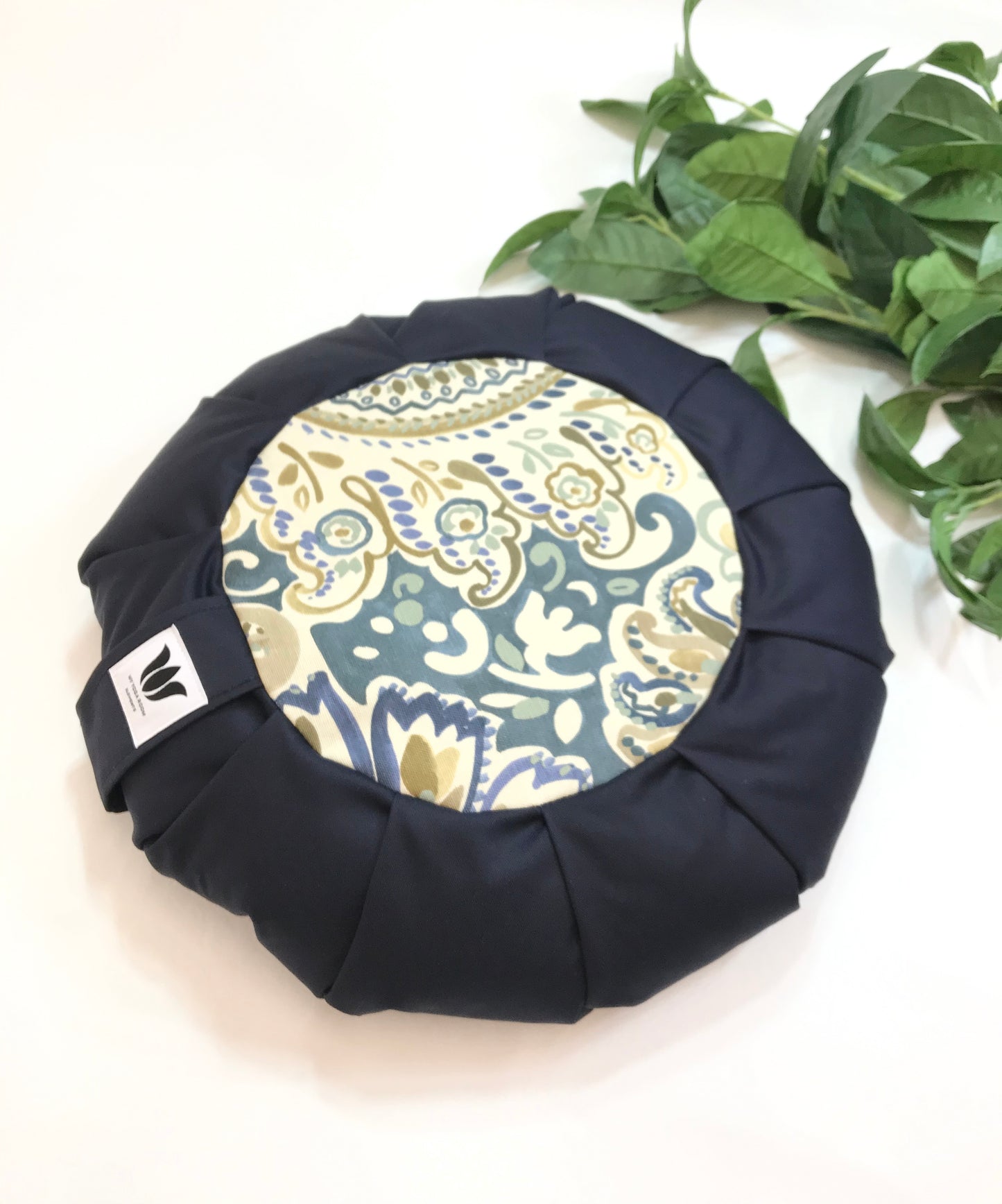 Handcrafted premium cotton canvas fabric meditation seat cushion in shades navy blue and blue, green, yellow modern graphic printfabric. Align the spine and body in comfort to calm the monkey mind in your meditation practice. Handcrafted in Calgary, Alberta Canada