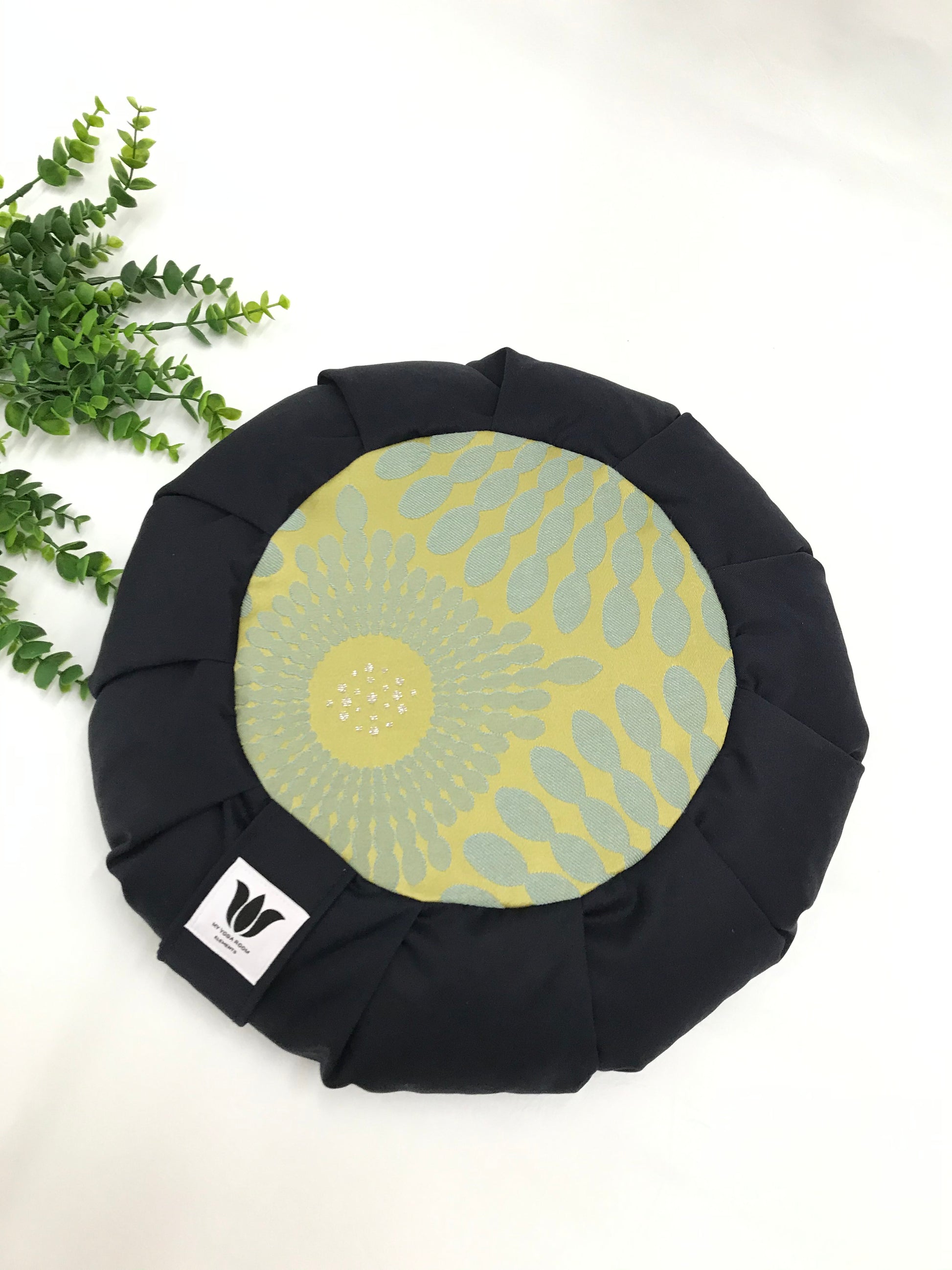 Handcrafted premium cotton canvas meditation seat cushion in solid navy blue and green, grey-blue and silver shot mandala center. Align the spine and body in comfort to calm the monkey mind in your meditation practice. Handcrafted in Calgary, Alberta Canada