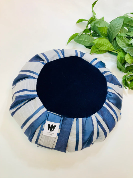 Handcrafted premium satin and linen textured meditation seat cushion in navy blue and and light grey strip with plush dark blue center in solid print. Align the spine and body in comfort to calm the monkey mind in your meditation practice. Handcrafted in Calgary, Alberta Canada