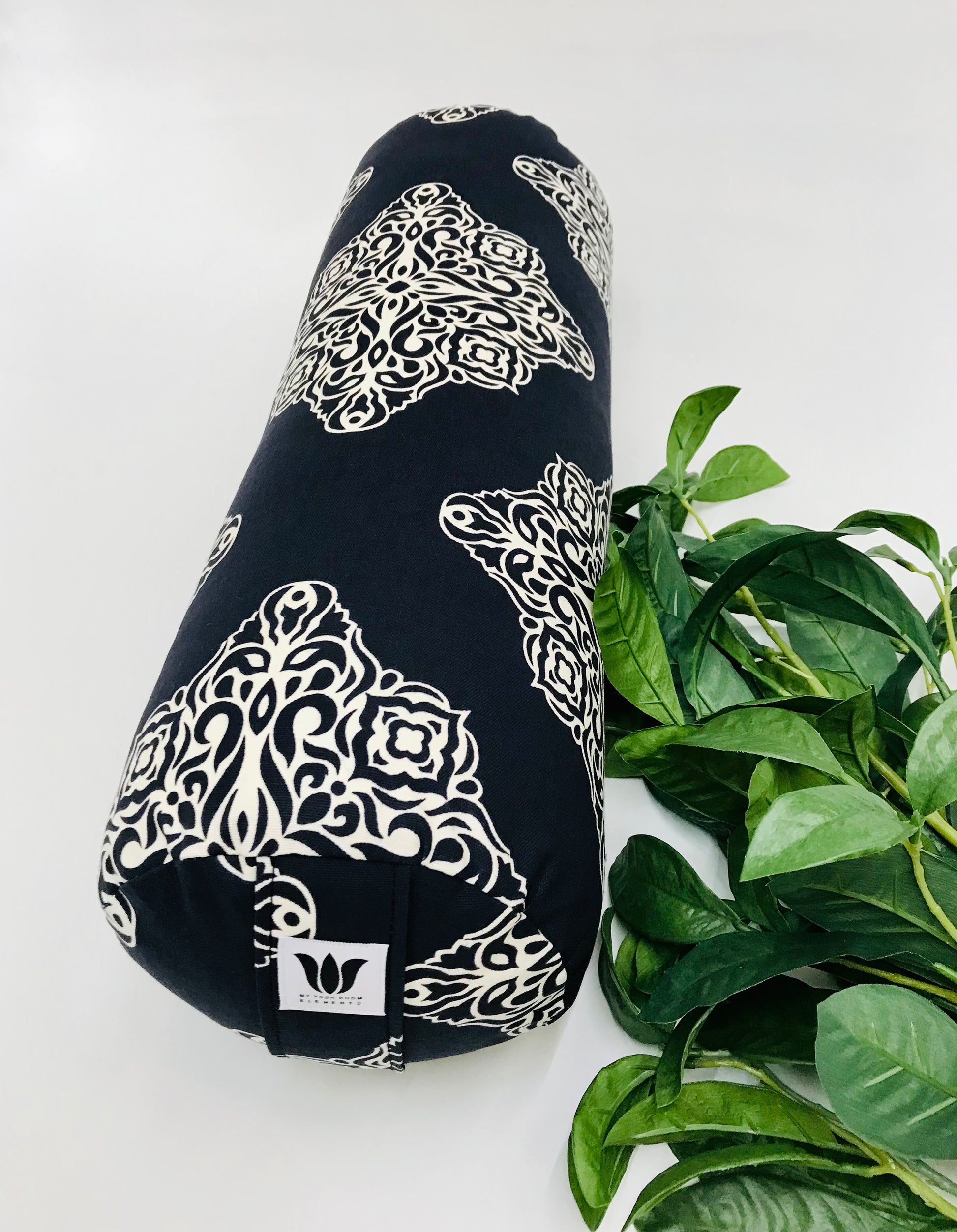 Round yoga bolster in blue and white modern mandala print fabric. Allergy conscious fill with removeable cover. Made in Canada by My Yoga Room Elements