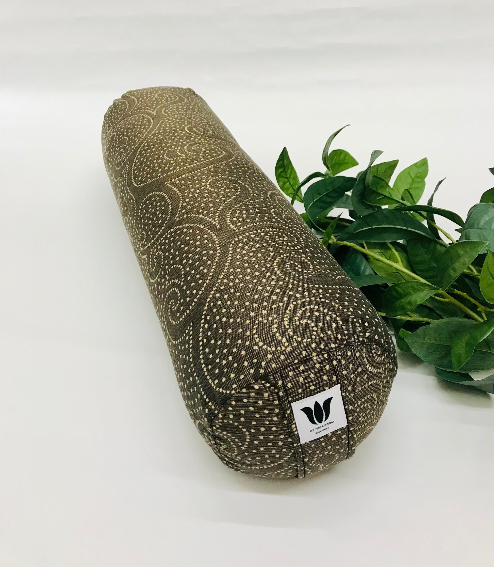 Round yoga bolster in brown durable swirl print fabric . Allergy conscious fill with removeable cover. Made in Canada by My Yoga Room Elements