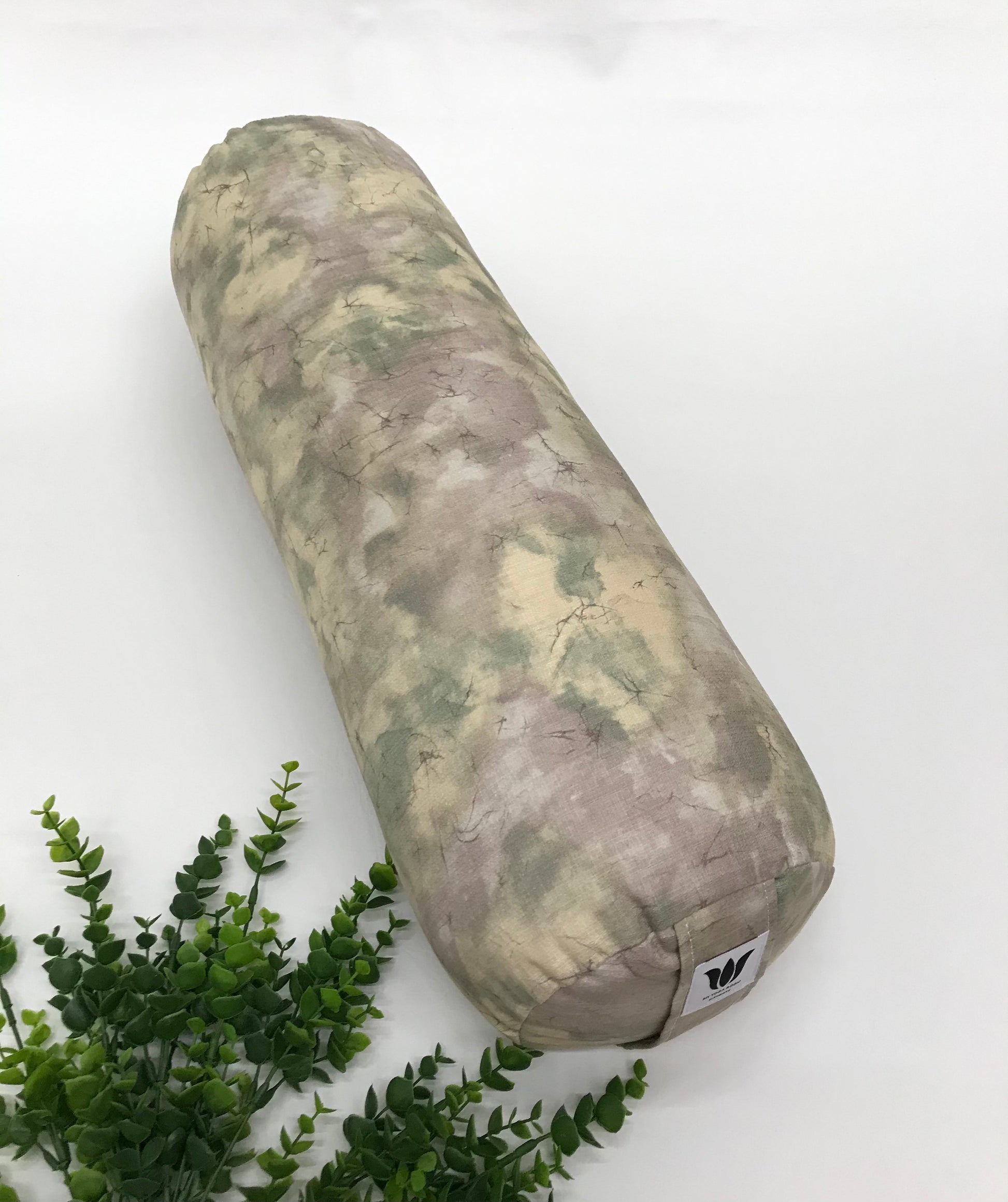 Round yoga bolster in durable poly cotton, in subtle purple marble print fabric. Allergy conscious fill with removeable cover. Made in Canada by My Yoga Room Elements