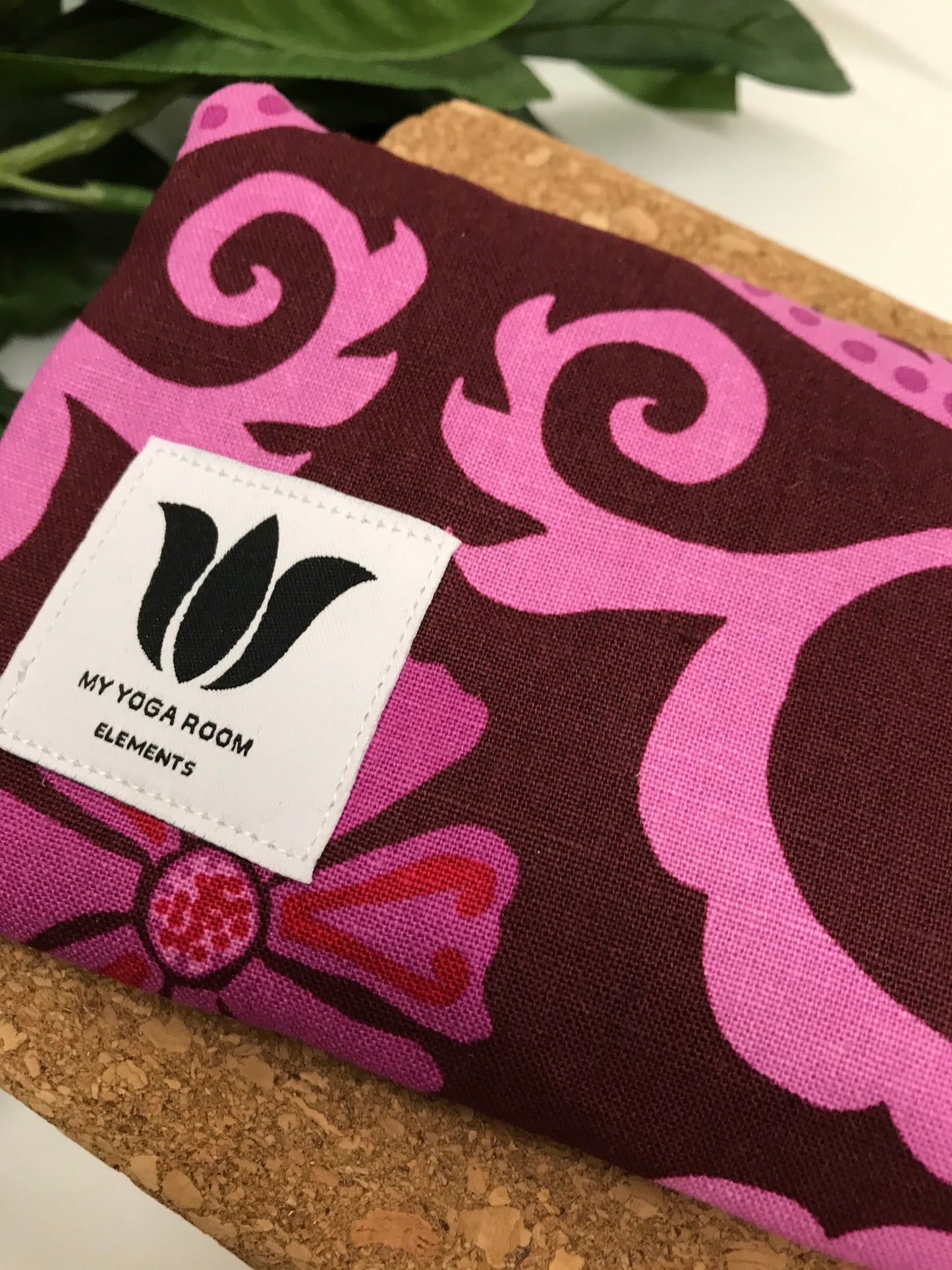 Yoga eye pillow, unscented, therapeutically weighted to soothe eye strain and stress or enhance your savasana. Handcrafted in Canada by My Yoga Room Elements. Pink purple modern floral print and bamboo fabric.