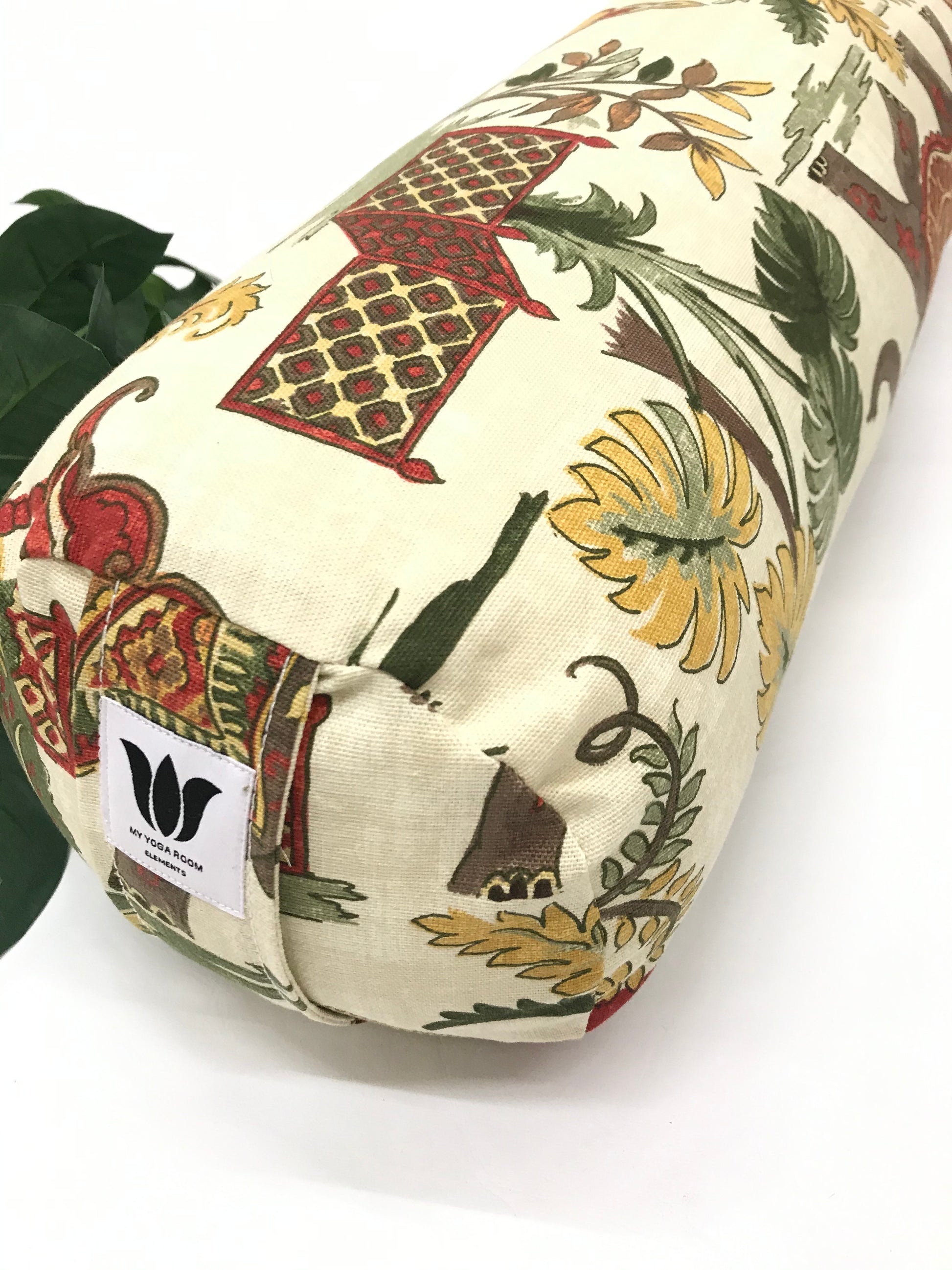Round yoga bolster in cotton canvas, novelty fabric with India images fabric. Allergy conscious fill with removeable cover. Made in Canada by My Yoga Room Elements