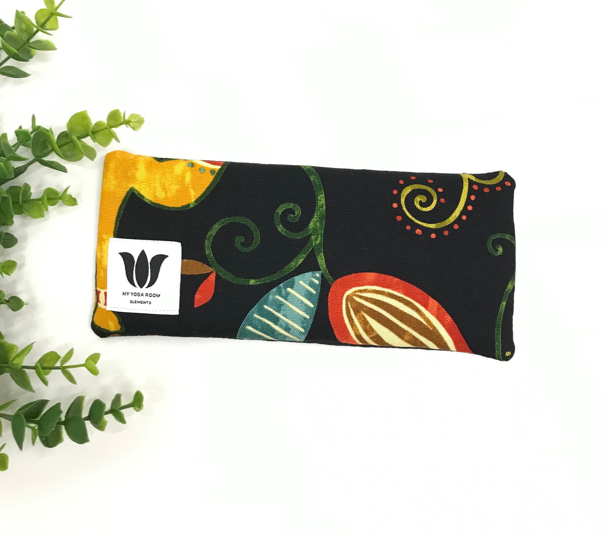 Yoga eye pillow, unscented, therapeutically weighted to soothe eye strain and stress or enhance your savasana. Handcrafted in Canada by My Yoga Room Elements. Rainbow black nature print and bamboo fabric.