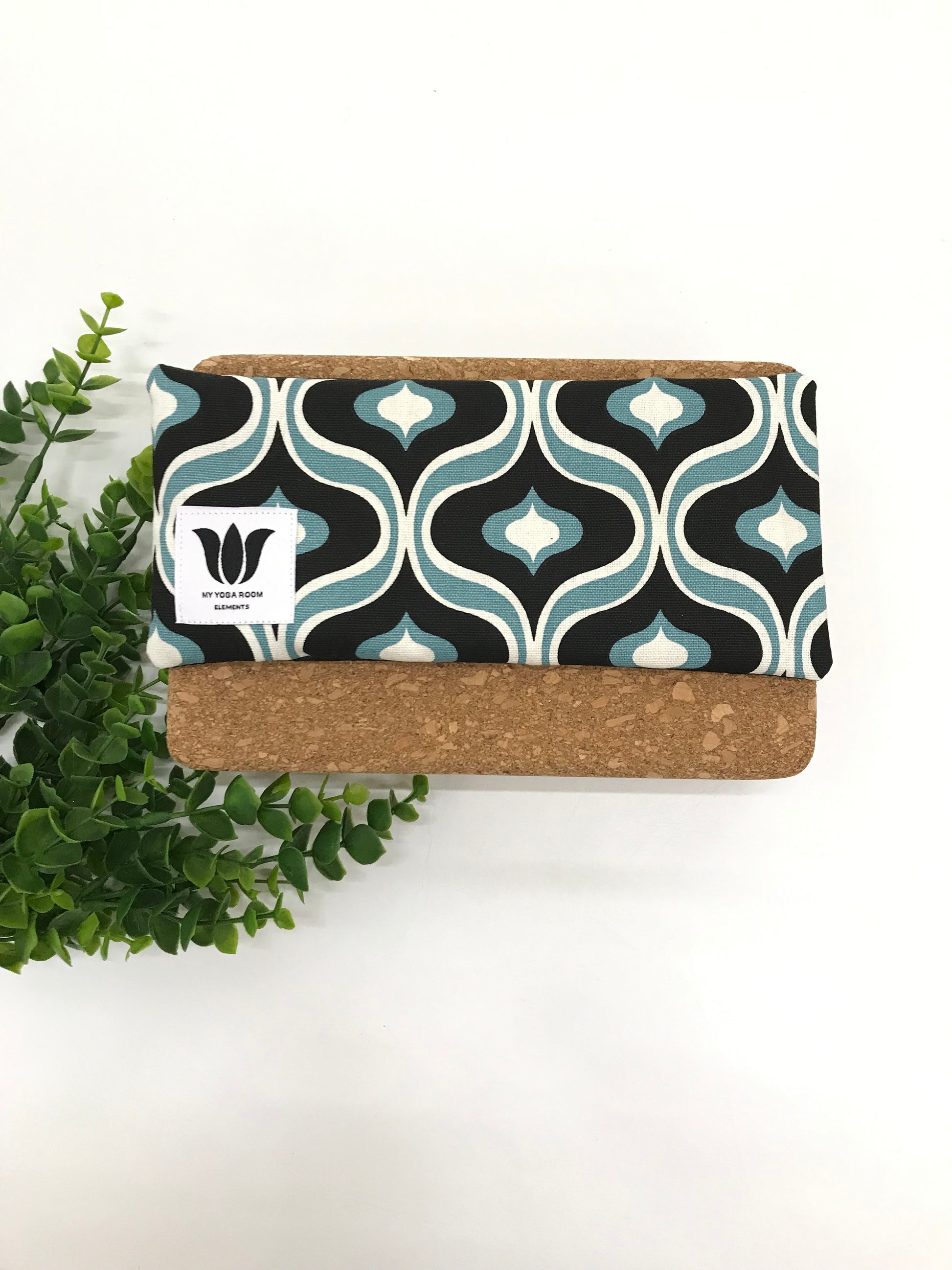 Yoga eye pillow, unscented, therapeutically weighted to soothe eye strain and stress or enhance your savasana. Handcrafted in Canada by My Yoga Room Elements. Black and turquoise mcm print and bamboo fabric.