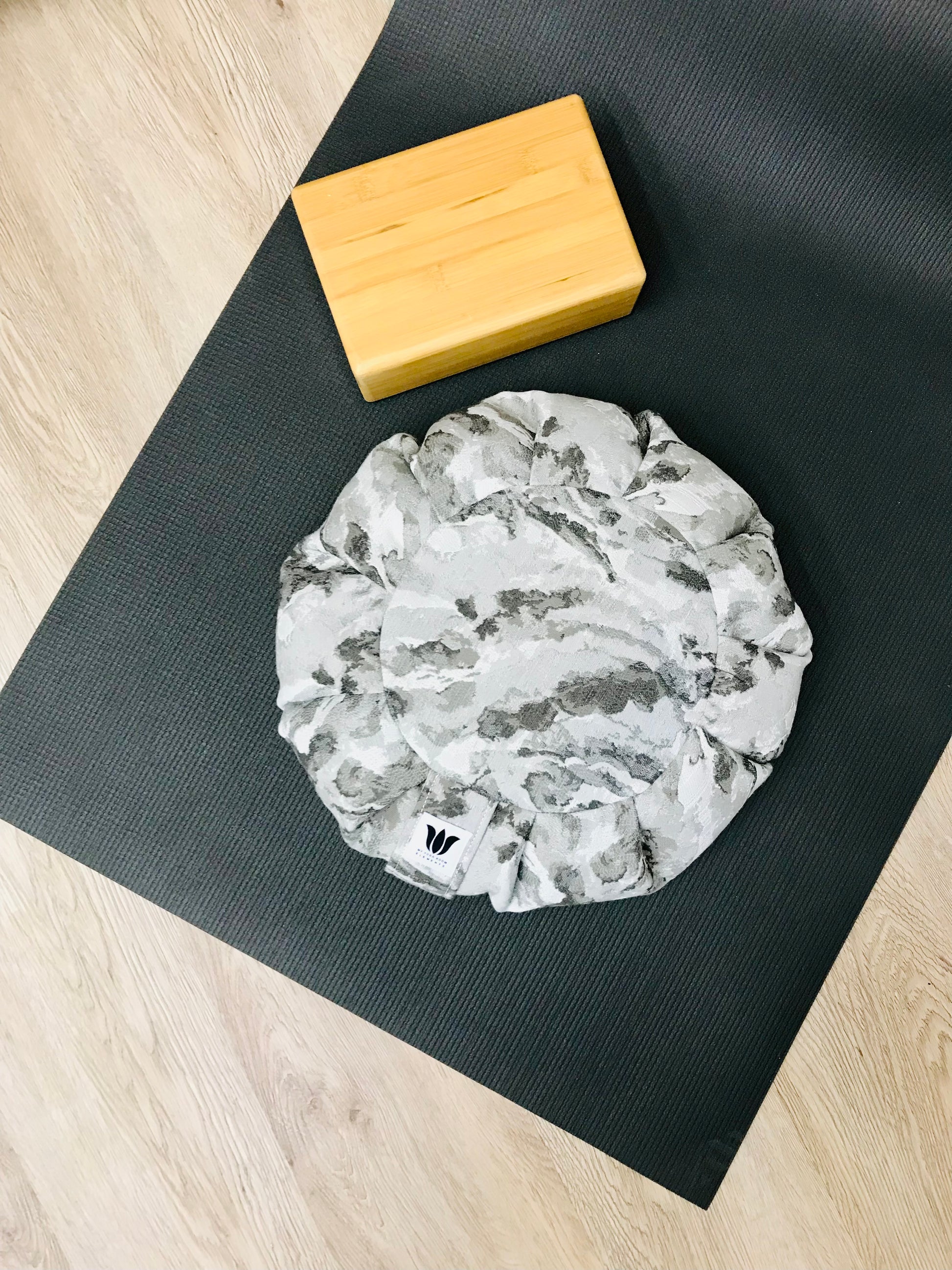 Handcrafted premium cotton home decor fabric meditation seat cushion in grey marble print fabric. Align the spine and body in comfort to calm the monkey mind in your meditation practice. Handcrafted in Calgary, Alberta Canada
