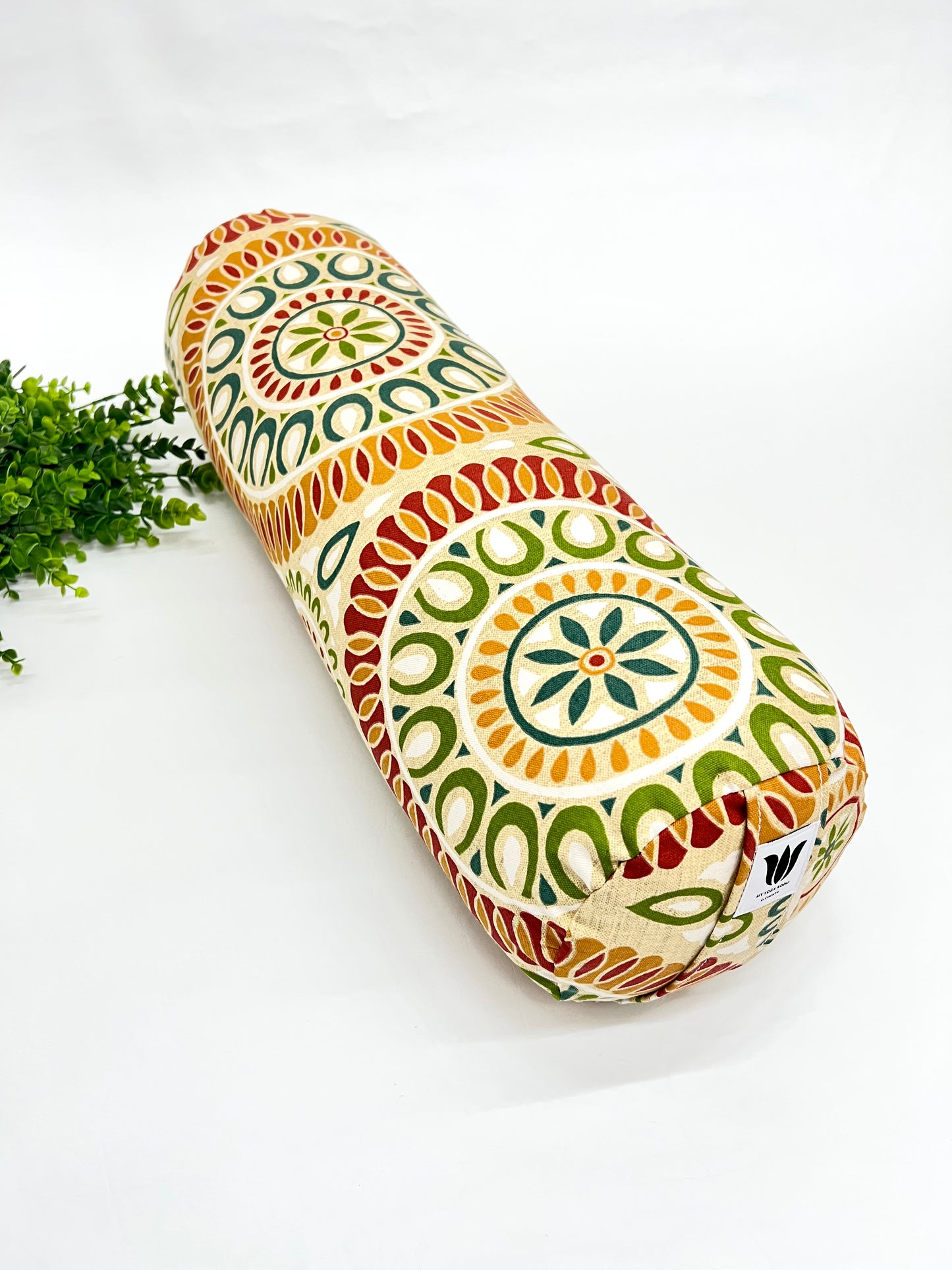 Round yoga bolster in cotton canvas citrus color mandala print fabric. Allergy conscious fill with removeable cover. Made in Canada by My Yoga Room Elements