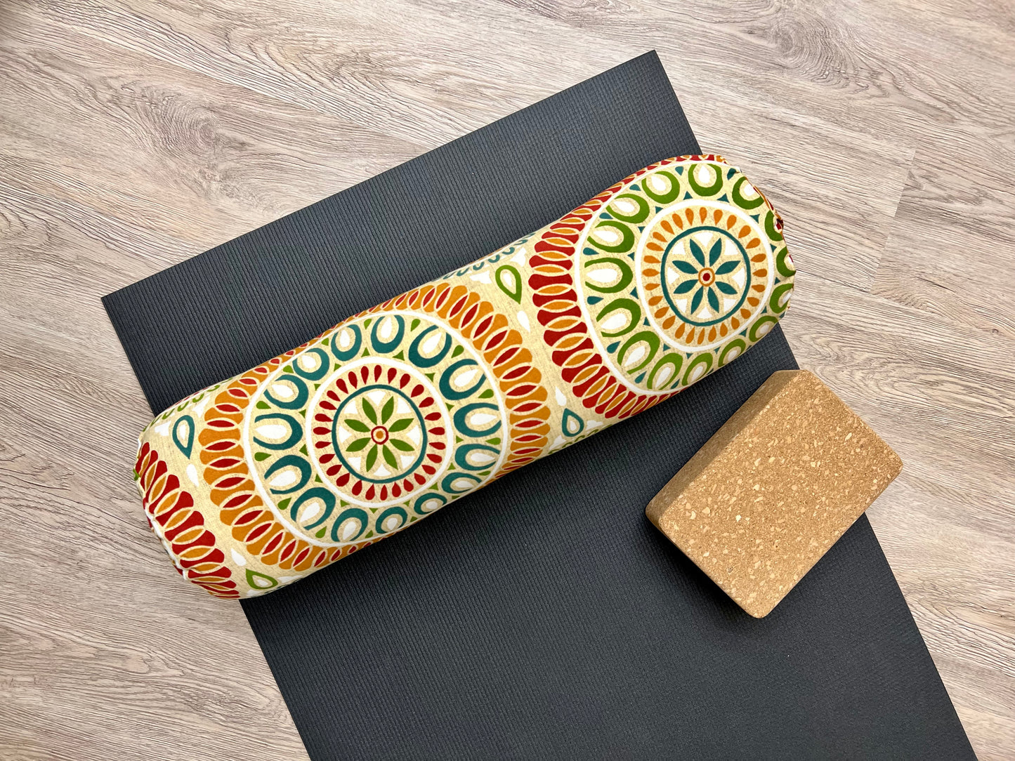 round yoga bolster in citrus color mandala print cotton fabric. made in calgary alberta canada