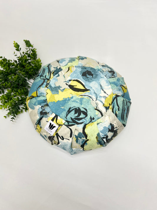 Handcrafted premium cotton canvas fabric meditation seat cushion in rich sea glass colour print fabric. Align the spine and body in comfort to calm the monkey mind in your meditation practice. Handcrafted in Calgary, Alberta Canada