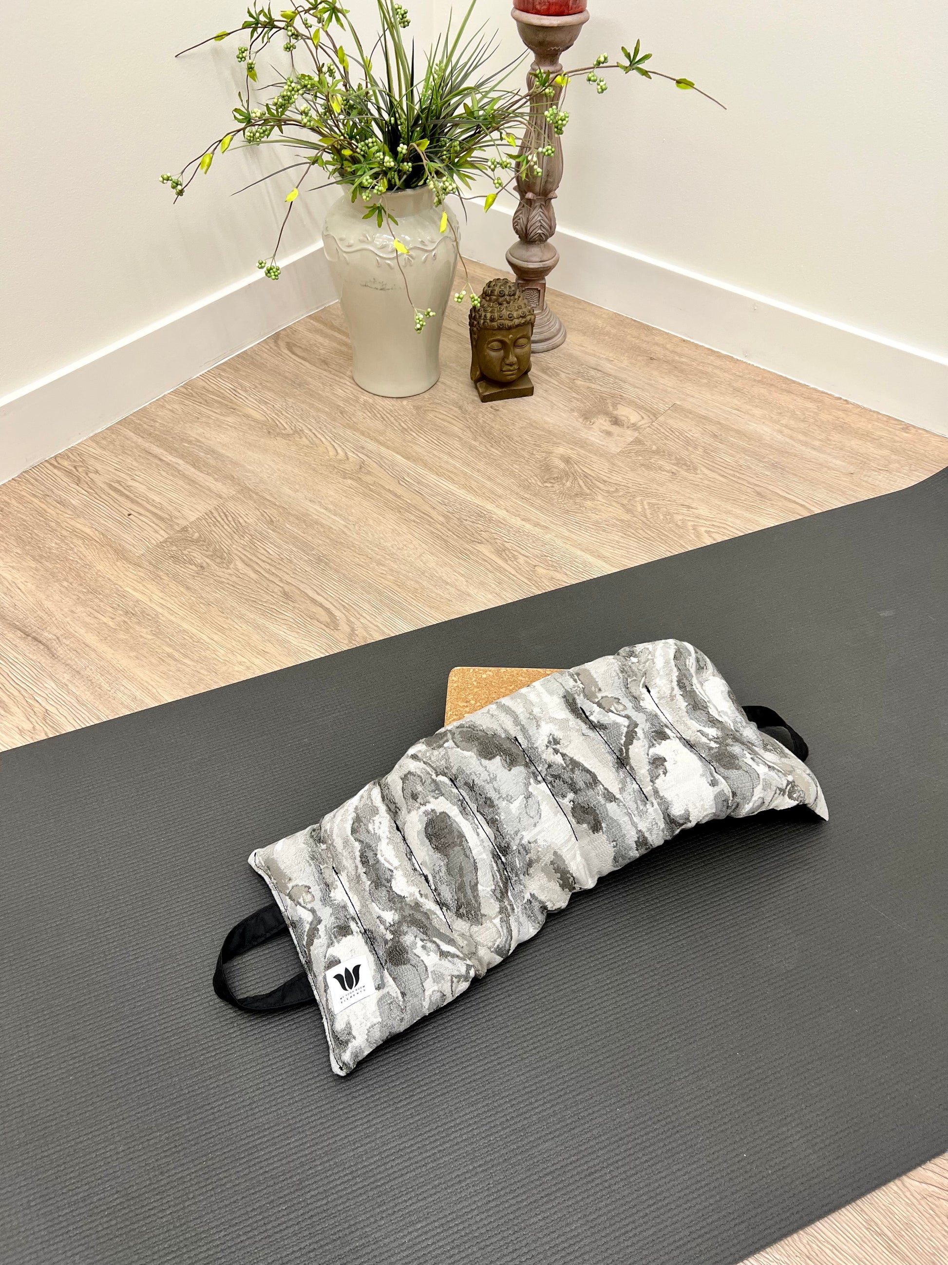 Yoga Sandbag version by My Yoga Room Elements. Add grounding to your practice with this heatable yoga prop. Handcrafted in Calgary in grey marble print fabric.