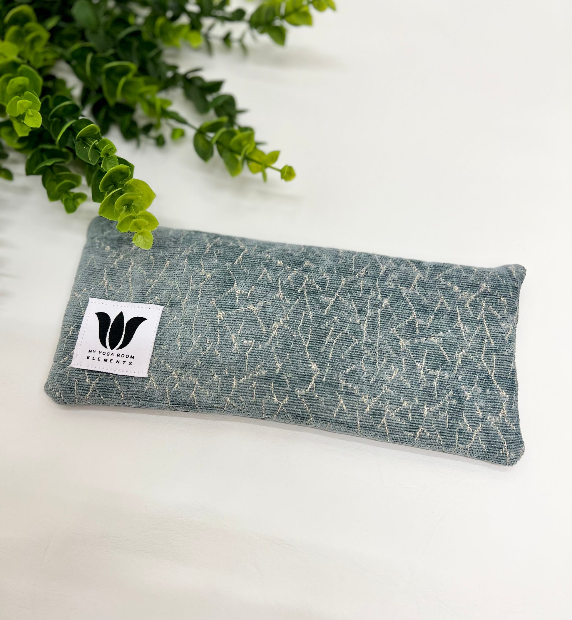 Yoga eye pillow, unscented, therapeutically weighted to soothe eye strain and stress or enhance your savasana. Handcrafted in Canada by My Yoga Room Elements. Sage and silver subtle print and bamboo fabric.