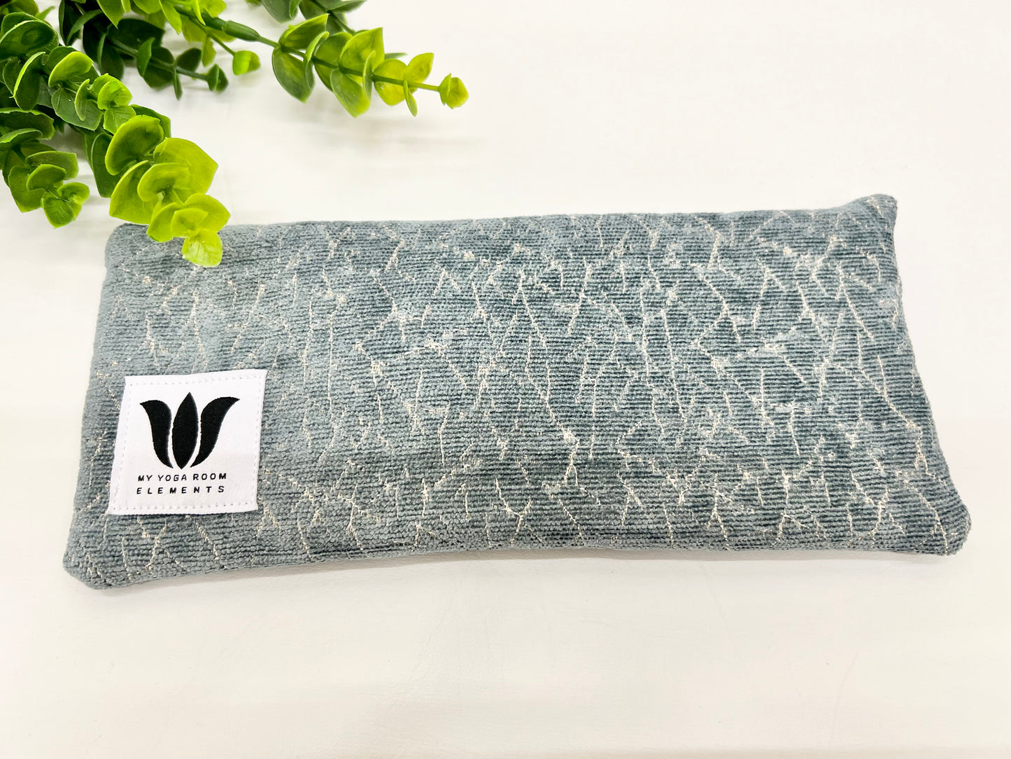 Yoga eye pillow, unscented, therapeutically weighted to soothe eye strain and stress or enhance your savasana. Handcrafted in Canada by My Yoga Room Elements. Sage and silver subtle print and bamboo fabric.