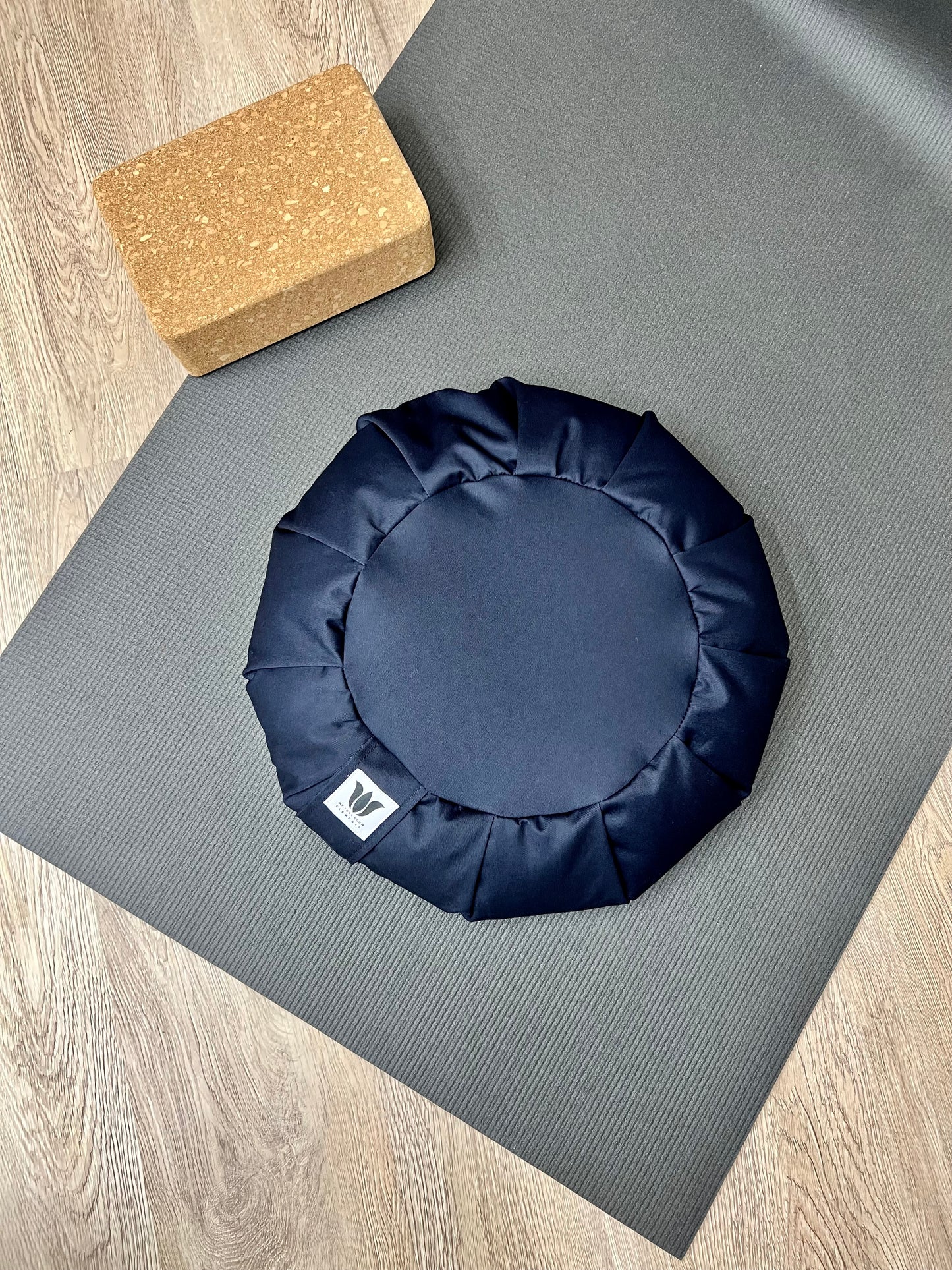 Handcrafted premium cotton canvas fabric meditation seat cushion in solid navy blue fabric. Align the spine and body in comfort to calm the monkey mind in your meditation practice. Handcrafted in Calgary, Alberta Canada