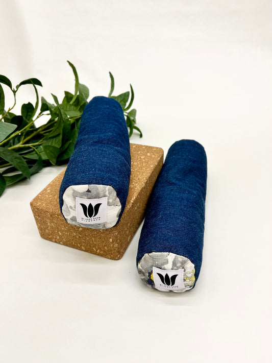 Mini yoga bolster in durable fabric, dark blue fabric. Cushion and support the body in the practice of yoga and meditation.Removeable cover. Made in Canada by My Yoga Room Elements
