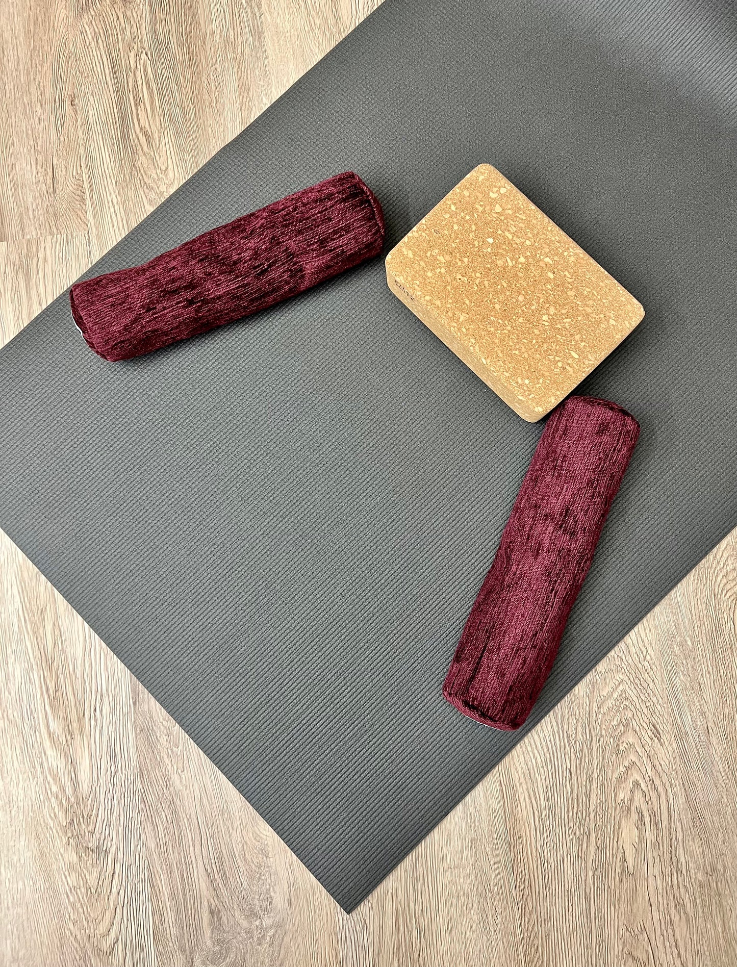 Mini yoga bolster in durable fabric, dark solid purple plush fabric. Cushion and support the body in the practice of yoga and meditation.Removeable cover. Made in Canada by My Yoga Room Elements