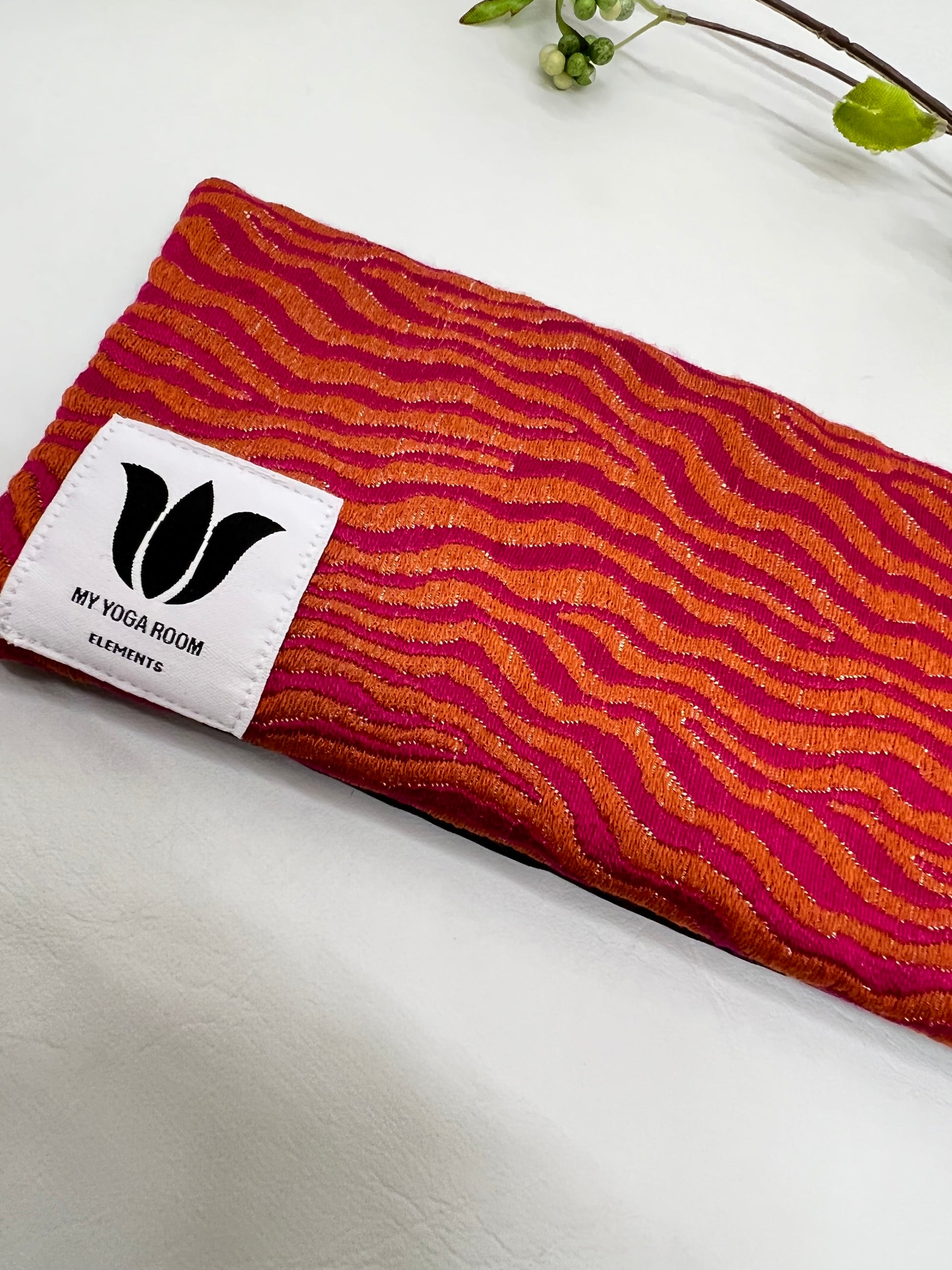Yoga eye pillow, unscented, therapeutically weighted to soothe eye strain and stress or enhance your savasana. Handcrafted in Canada by My Yoga Room Elements. Orange/pink modern print and bamboo fabric.