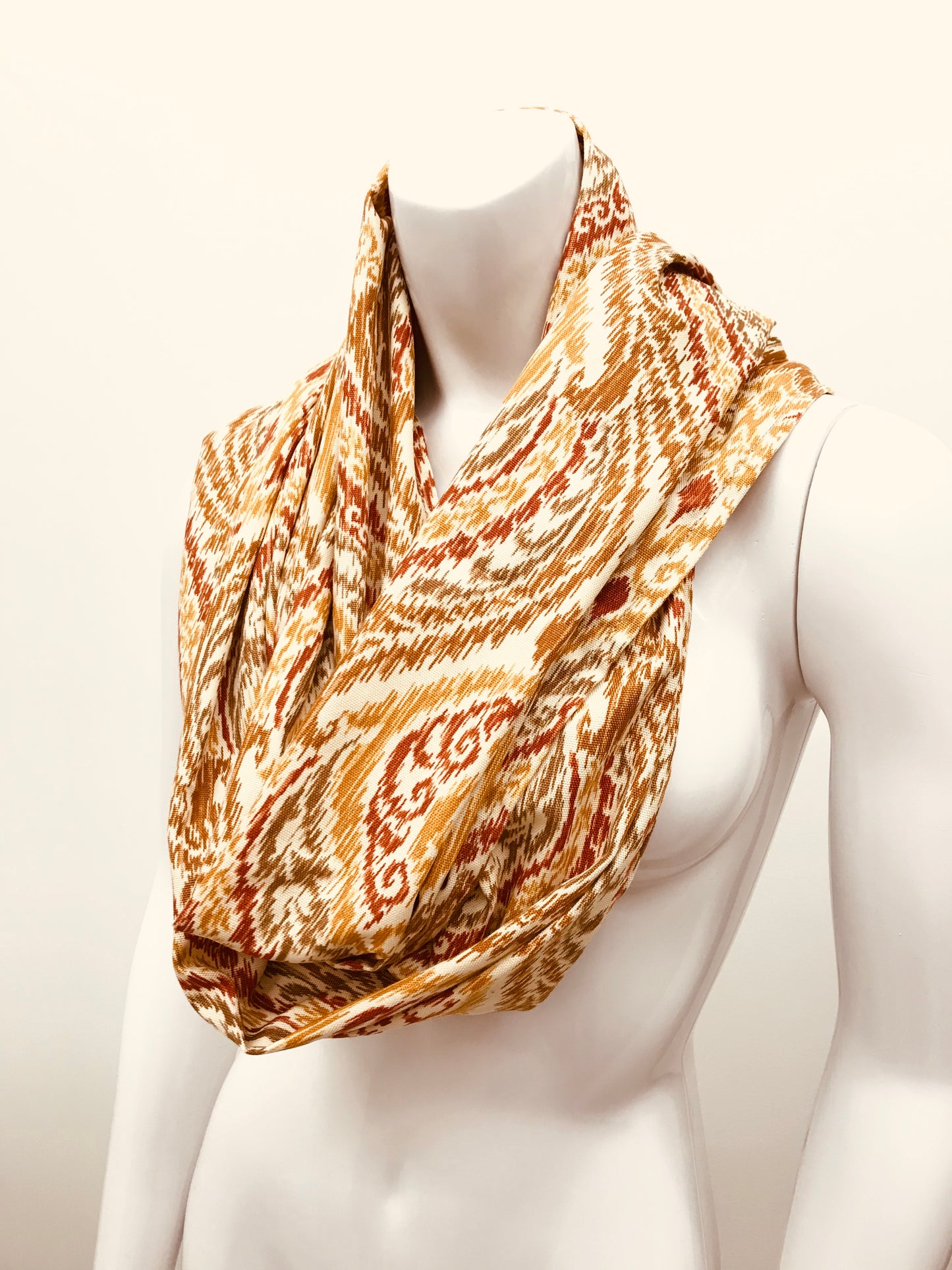 Turn your infinity scarf into a support for your meditation practice, quick snap and adjust to align the spine and sit in comfort. Created by My Yoga Room Elements and produced in Canada . Orange and Gold Damask