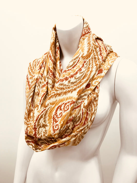 Turn your infinity scarf into a support for your meditation practice, quick snap and adjust to align the spine and sit in comfort. Created by My Yoga Room Elements and produced in Canada . Orange and Gold Damask