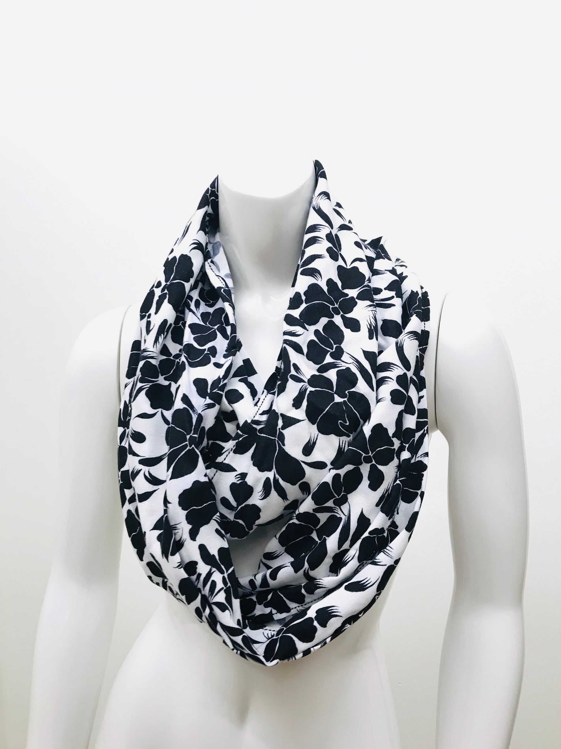 Turn your infinity scarf into a support for your meditation practice, quick snap and adjust to align the spine and sit in comfort. Created by My Yoga Room Elements and produced in Canada. Black and white floral print