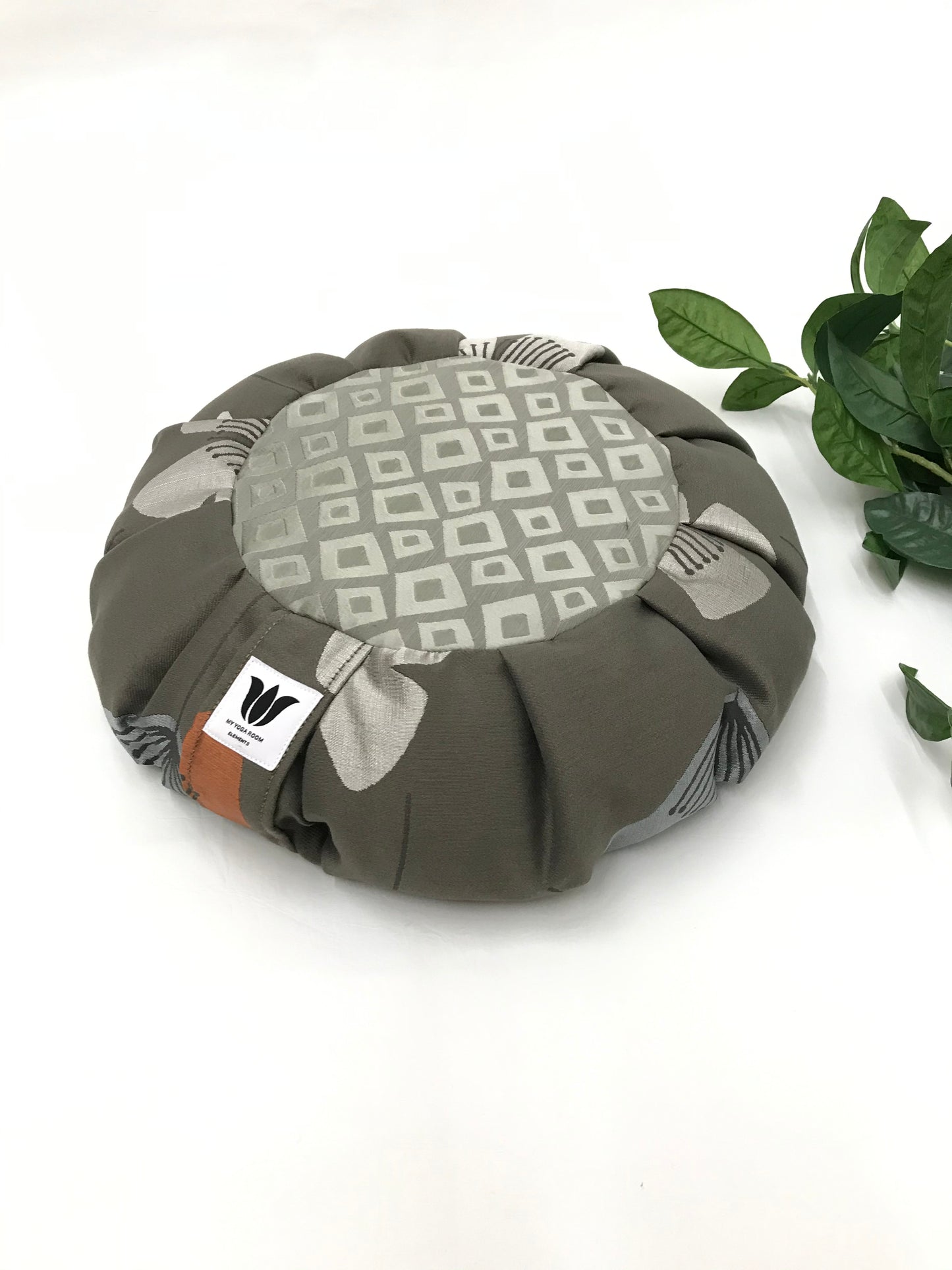 Handcrafted premium home decor fabric meditation seat cushion in rich sage gray green print fabric. Align the spine and body in comfort to calm the monkey mind in your meditation practice. Handcrafted in Calgary, Alberta Canada