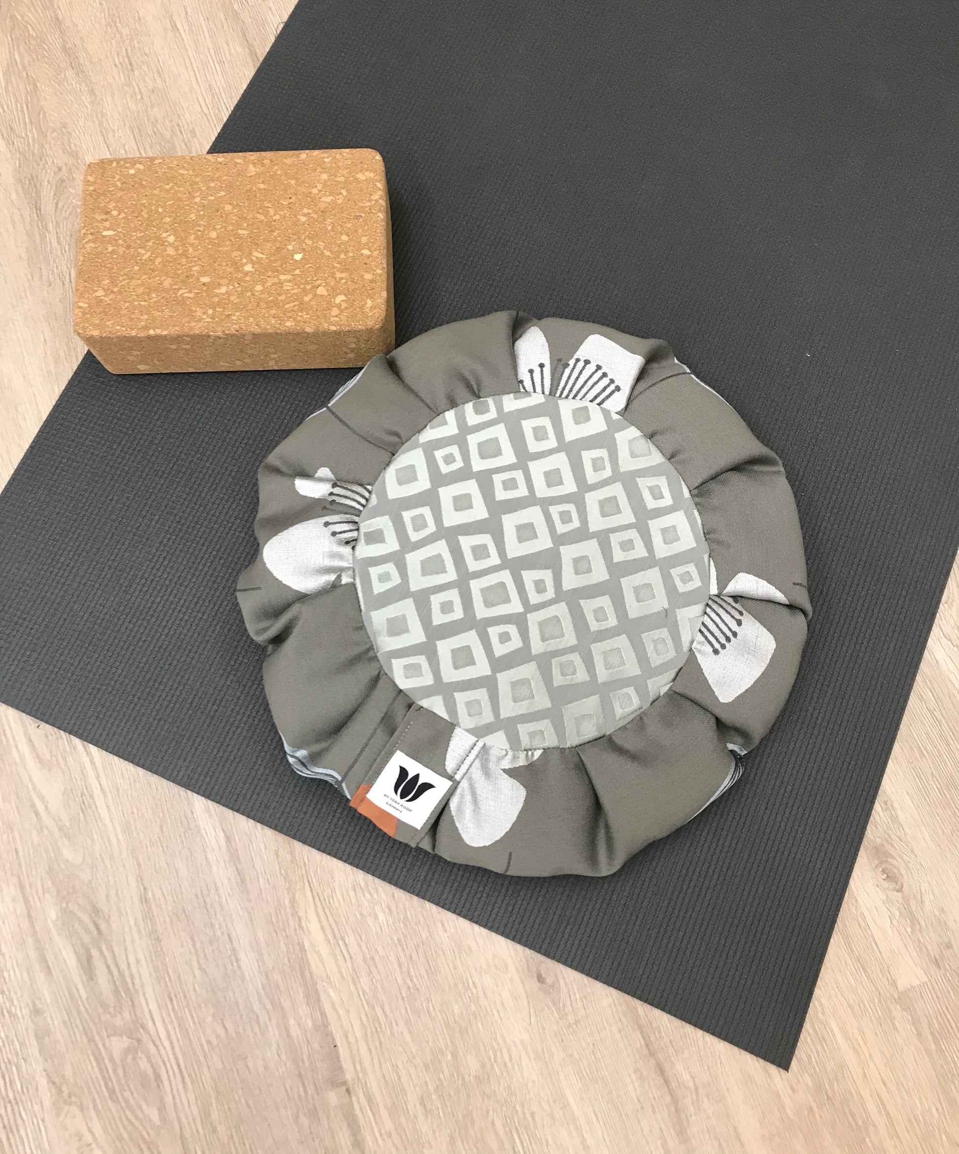 Handcrafted premium home decor fabric meditation seat cushion in rich sage gray green print fabric. Align the spine and body in comfort to calm the monkey mind in your meditation practice. Handcrafted in Calgary, Alberta Canada
