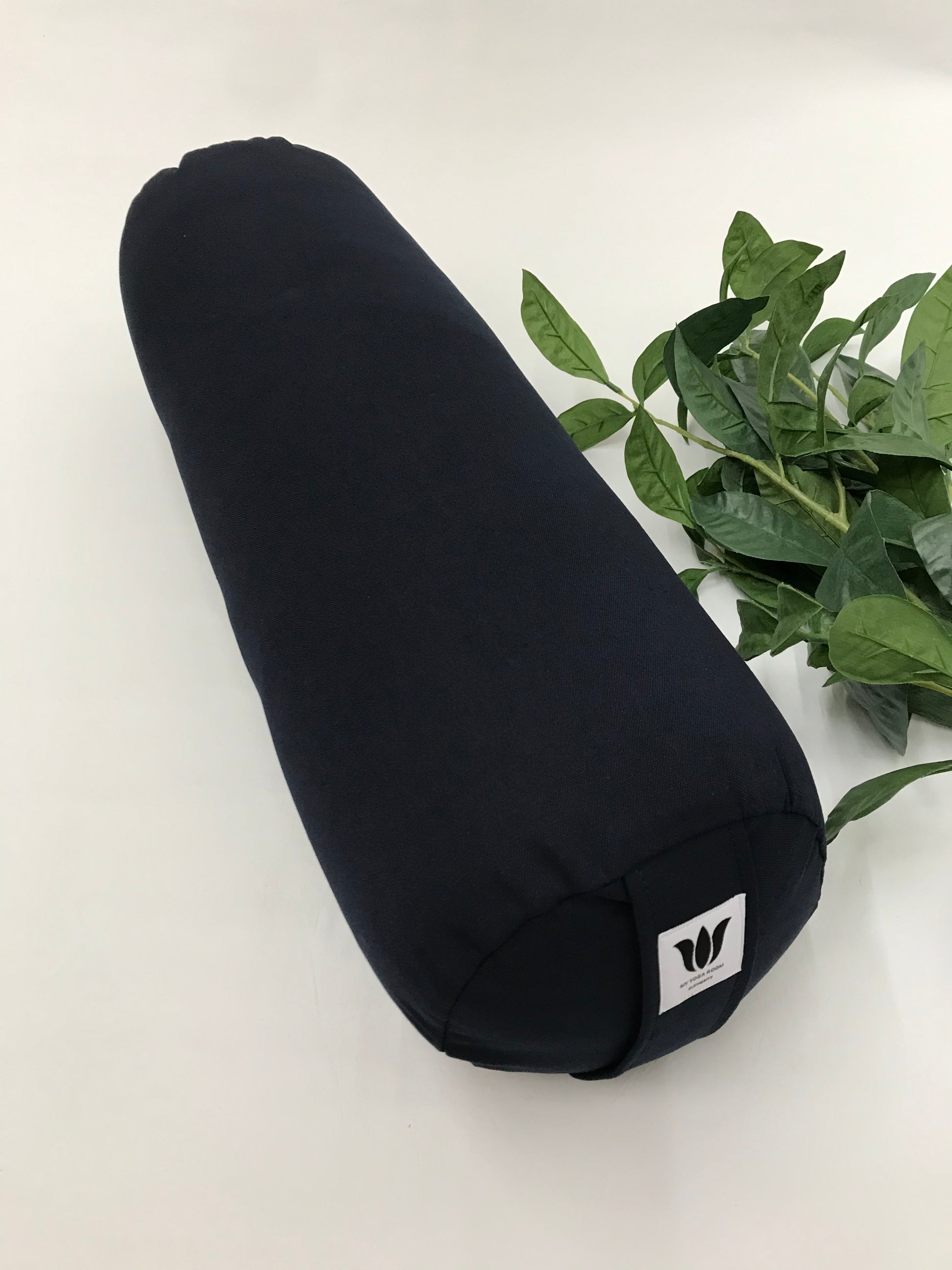 Round yoga bolster in durable cotton canvas, in solid navy blue fabric. Allergy conscious fill with removeable cover. Made in Canada by My Yoga Room Elements