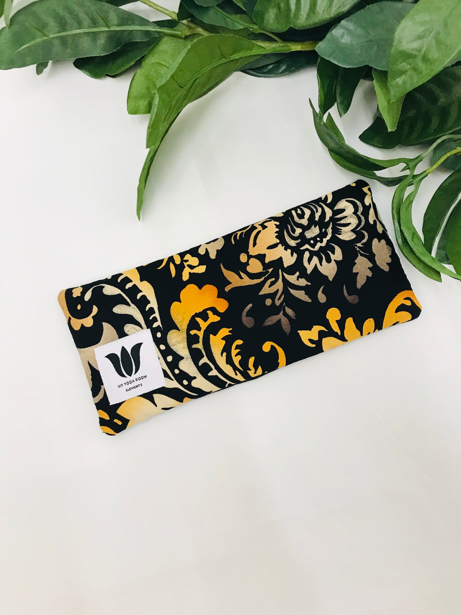 Yoga eye pillow, unscented, therapeutically weighted to soothe eye strain and stress or enhance your savasana. Handcrafted in Canada by My Yoga Room Elements. Autumn damask print and bamboo fabric.
