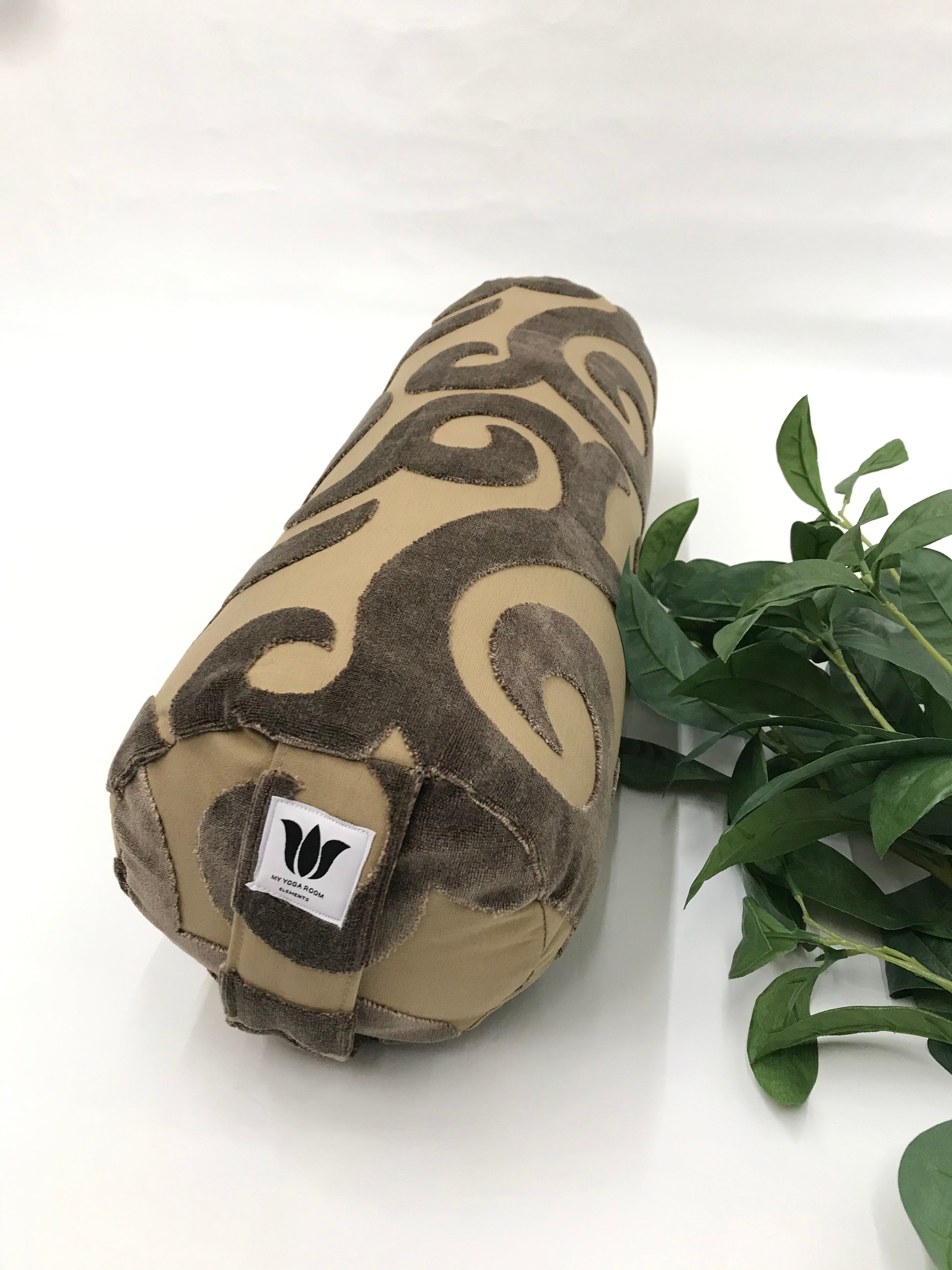Round yoga bolster in plush brown cotton and linen swirl print fabric . Allergy conscious fill with removeable cover. Made in Canada by My Yoga Room Elements