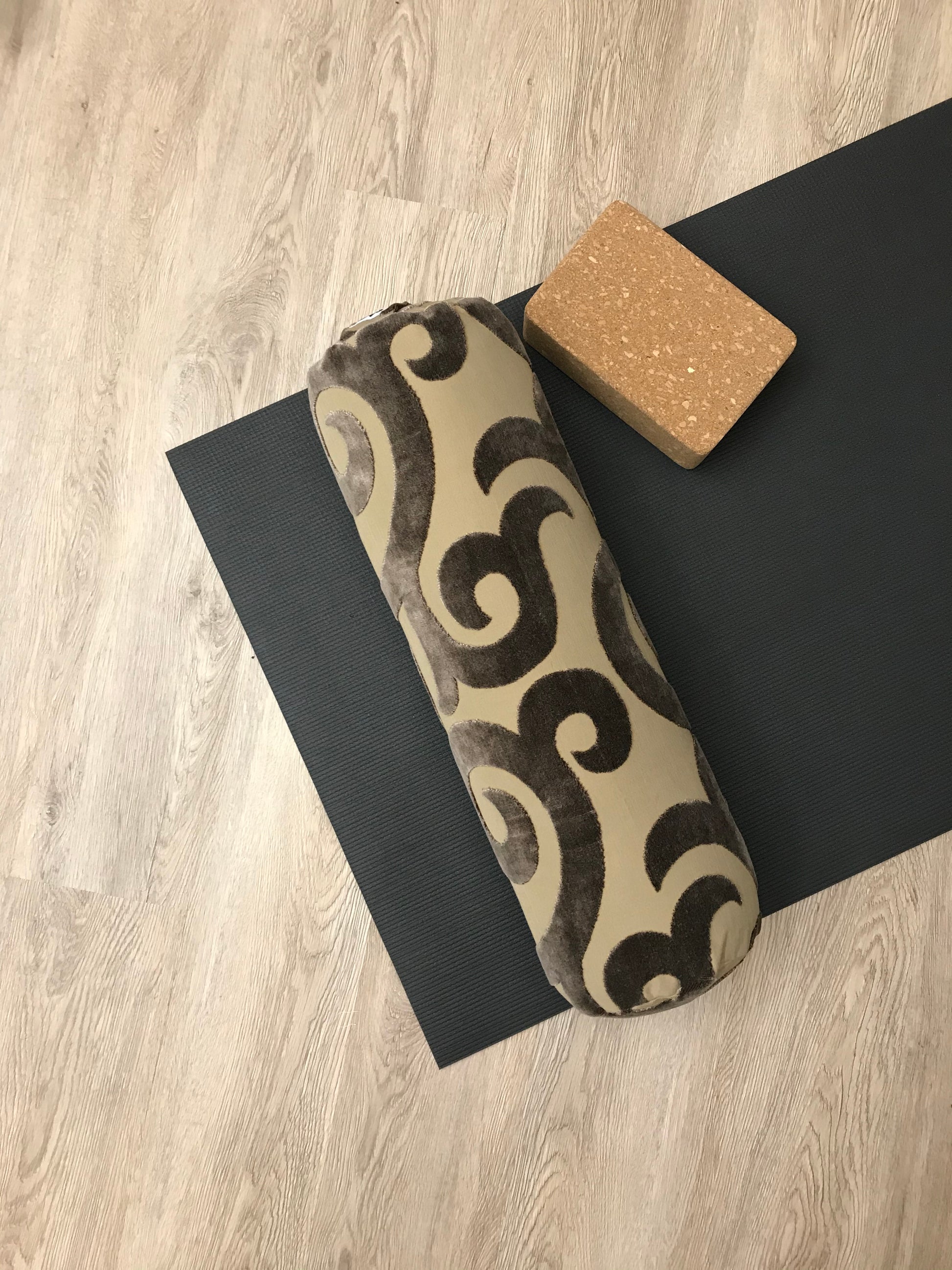 Round yoga bolster in plush brown cotton and linen swirl print fabric . Allergy conscious fill with removeable cover. Made in Canada by My Yoga Room Elements