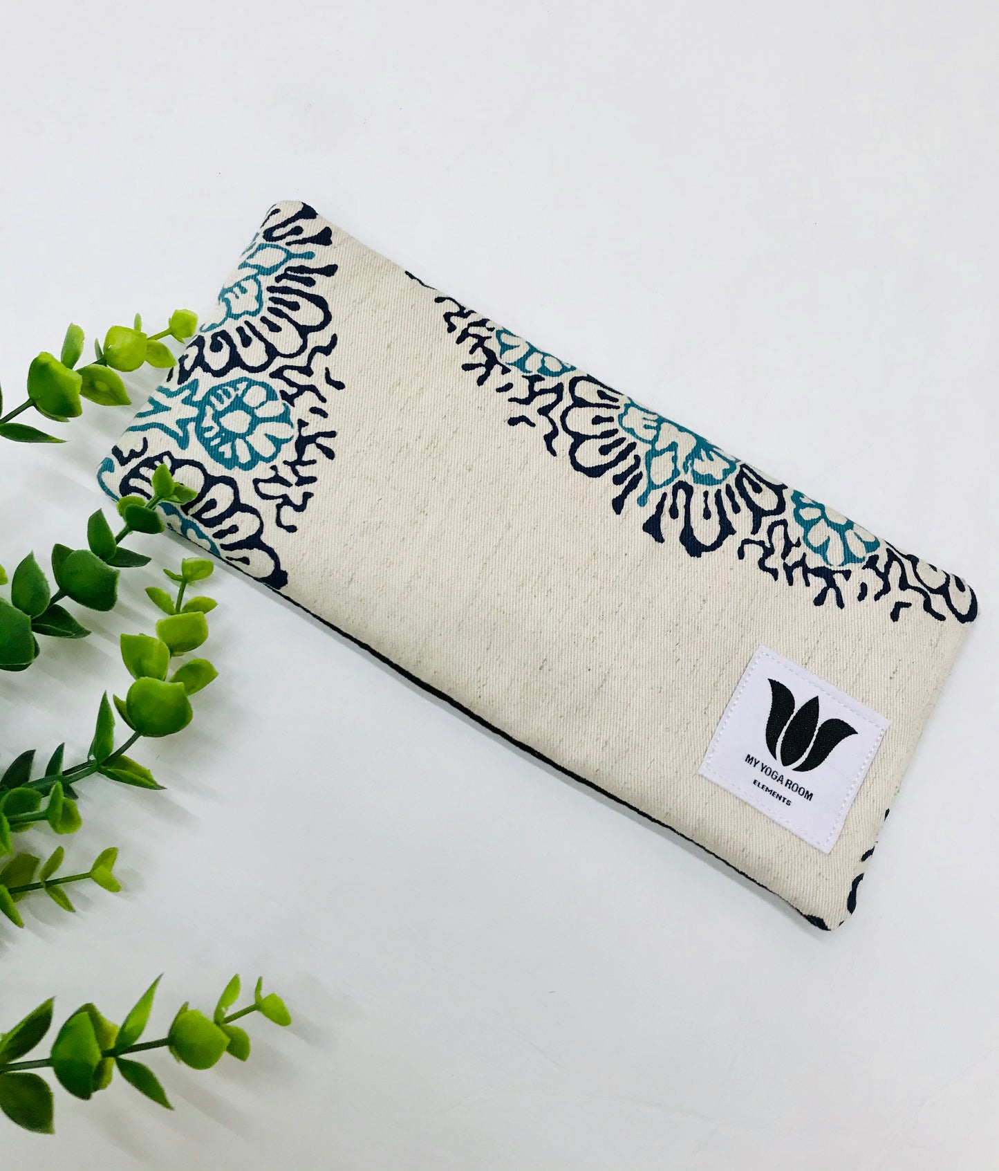 Yoga pillow, therapeutically weighted to soothe eye strain and stress in natural linen and bamboo mandala fabric. Handcrafted in Canada by My Yoga Room Elements.