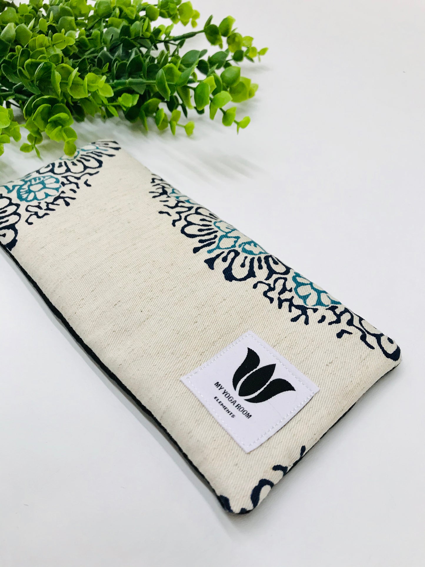 Yoga pillow, therapeutically weighted to soothe eye strain and stress in natural linen and bamboo mandala fabric. Handcrafted in Canada by My Yoga Room Elements.